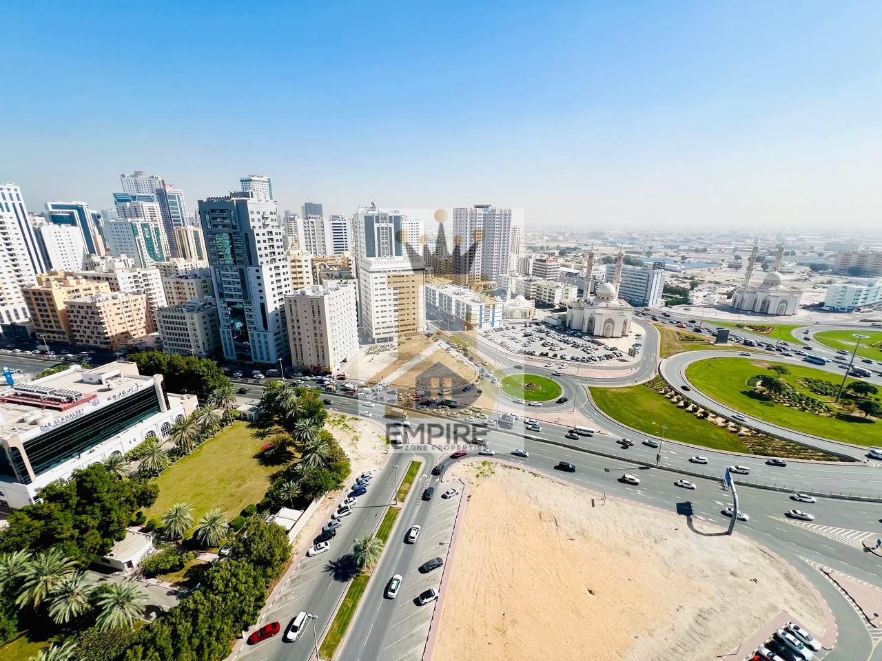 luxury living with huge balcony open view one parking free maid room wardrobes maintenance free prime location on main road building near close exit to dubai