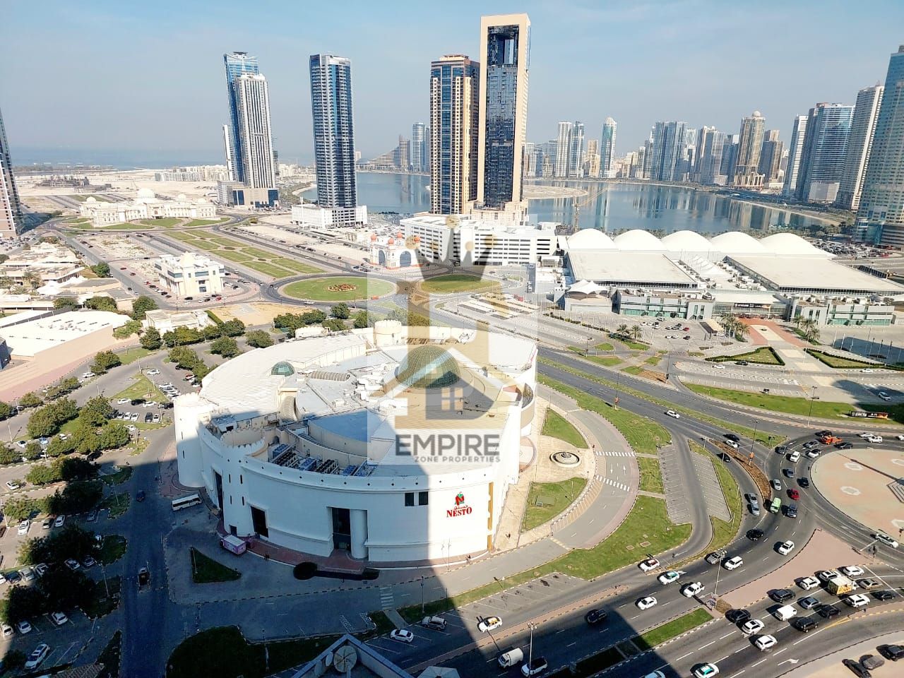 luxury living with full sea view with huge balcony wardrobes maid room good finishing gym&pool and maintenance free one parking free prime location on main road building near close exit to dubai