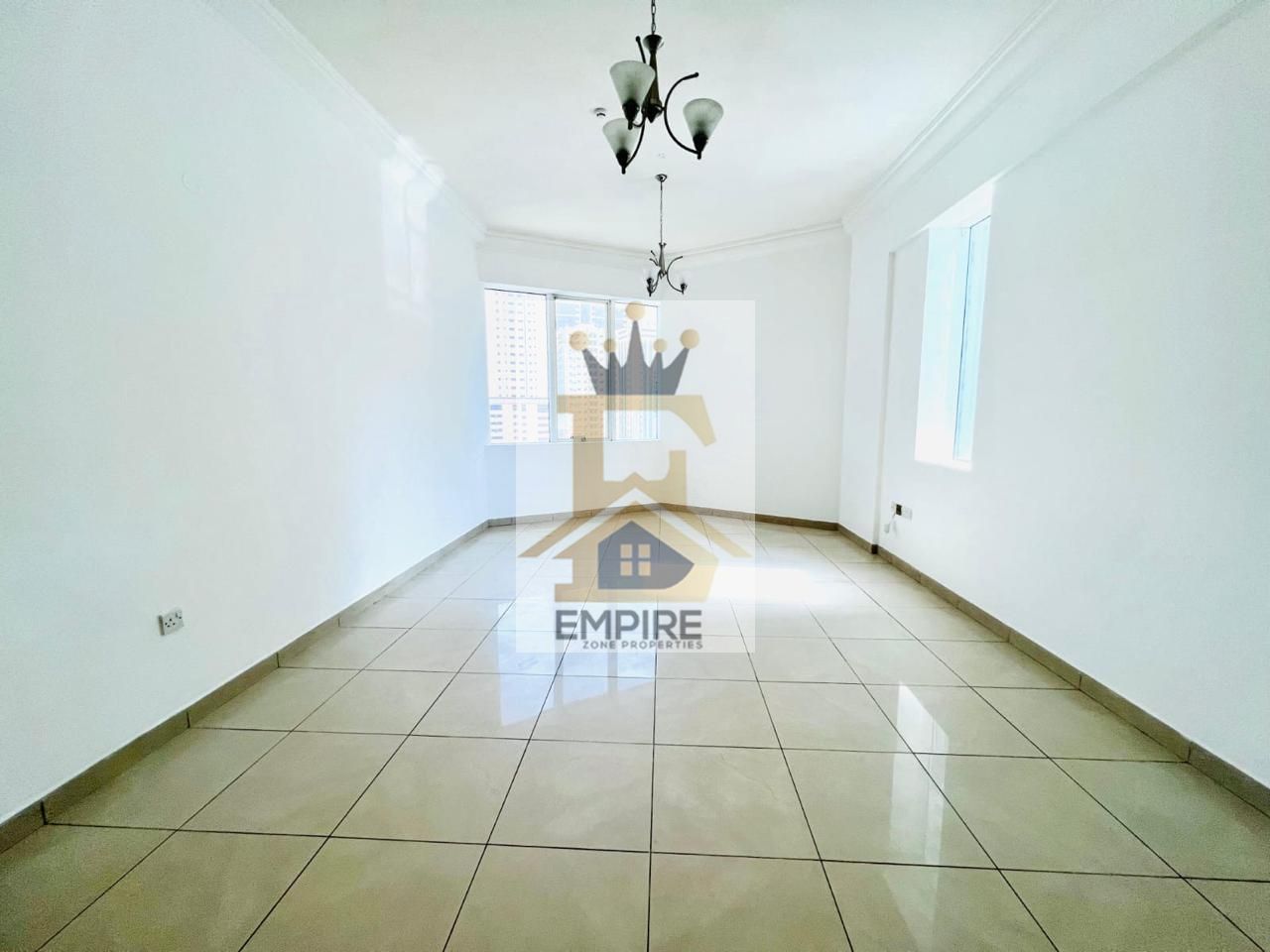 luxury living with open view wardrobes big windows good finishing gym&pool and maintenance prime location on main road building near close exit to dubai