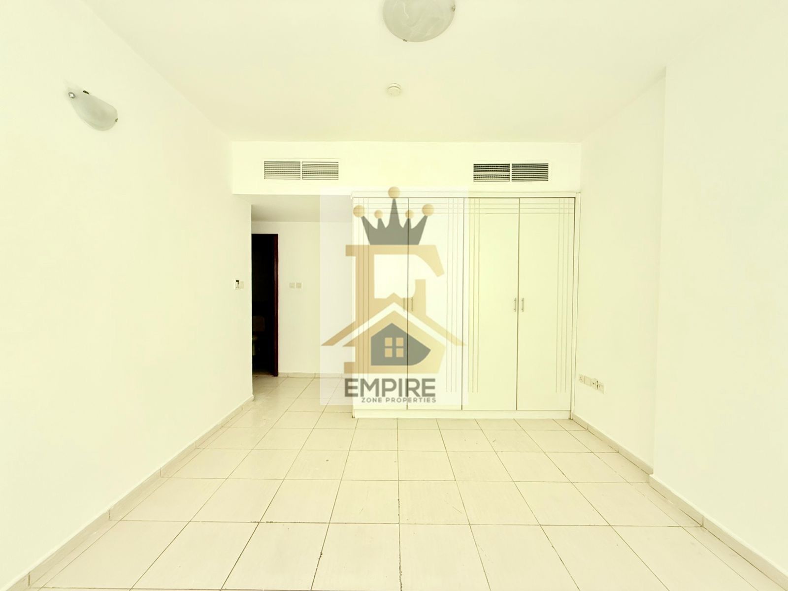 Bright apartment with balcony and gym pool. Wardrobe and master bedroom