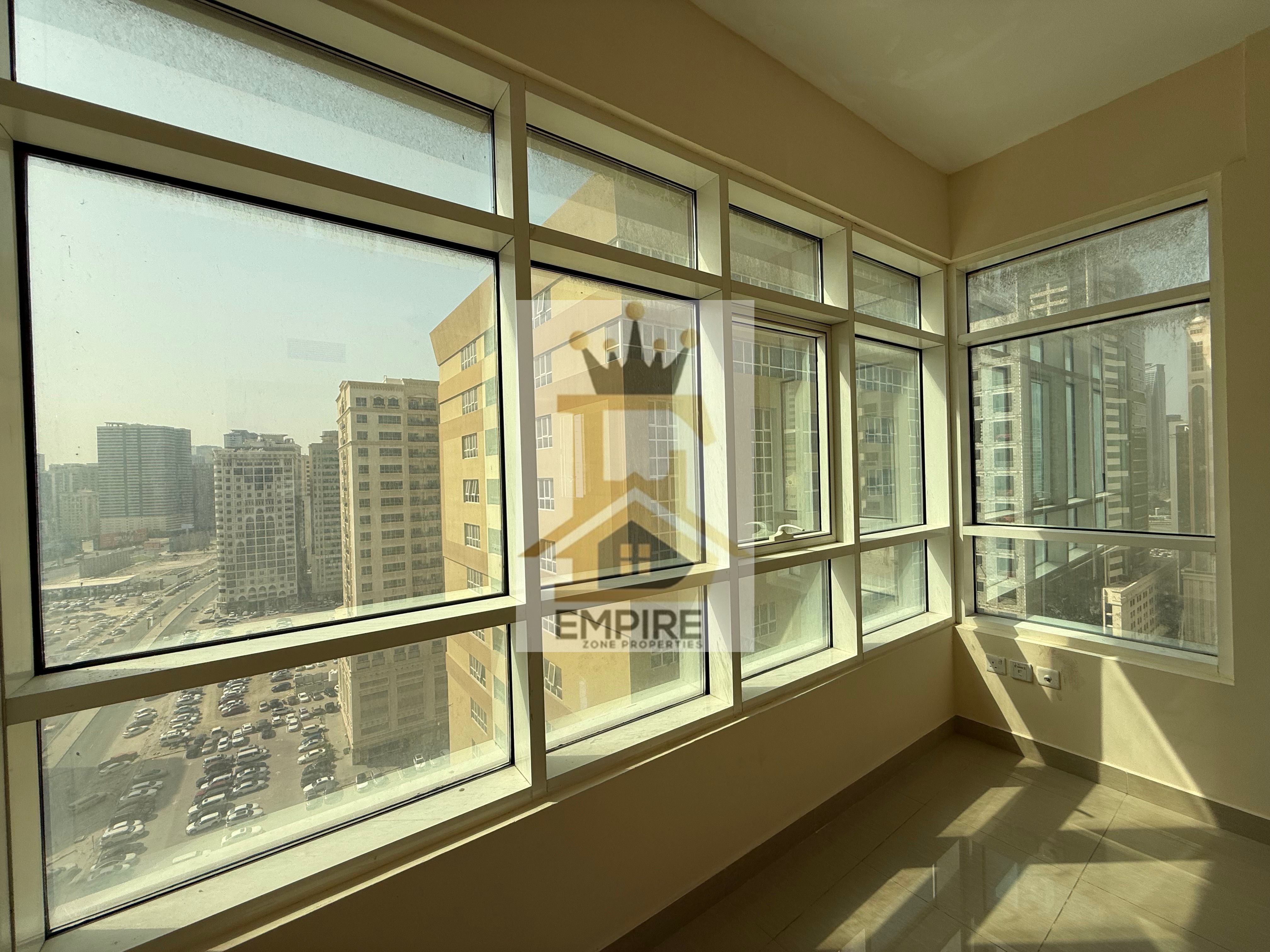 Bright apartment with open view free parking easy exit to Dubai