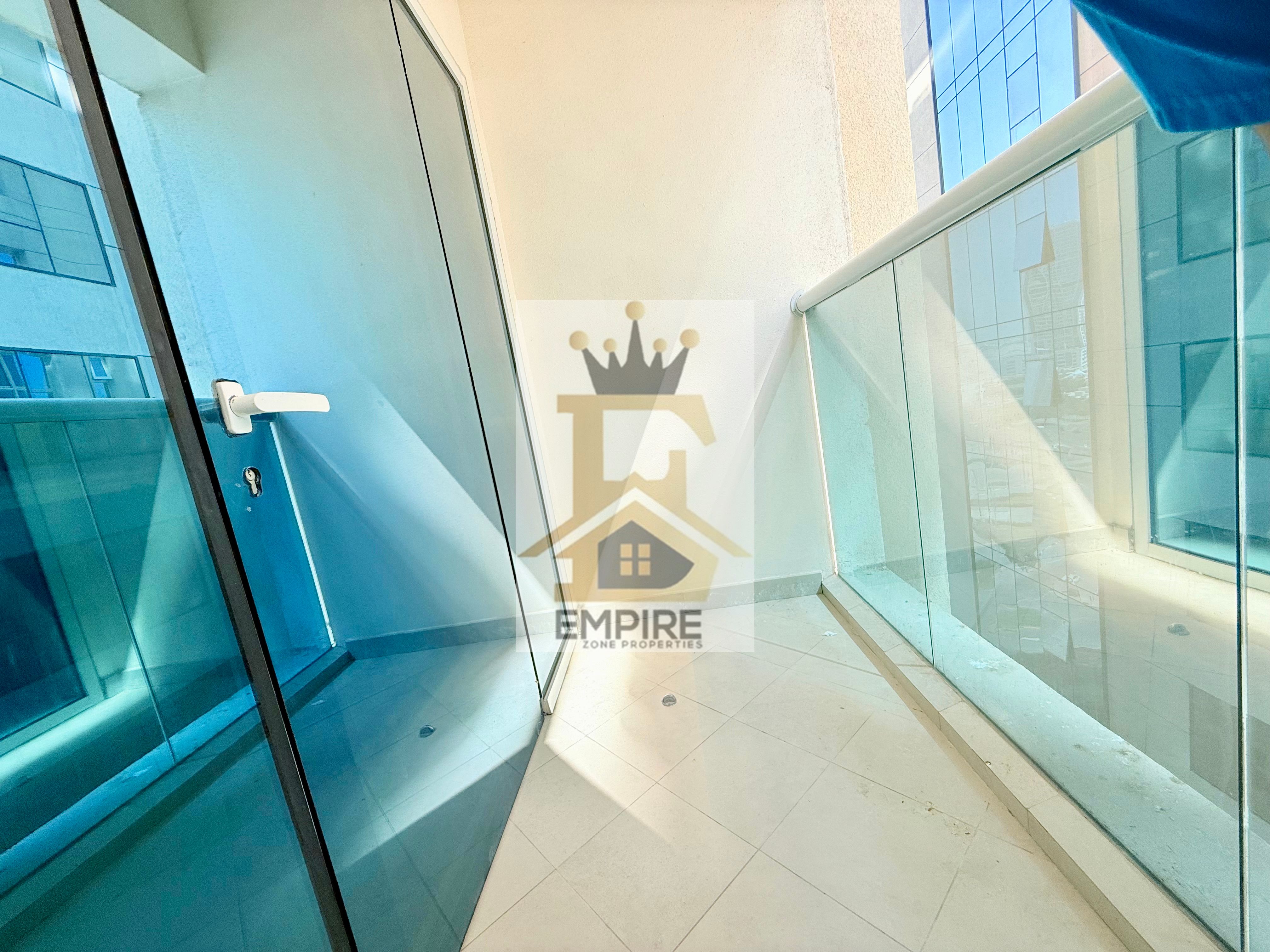 New Bulliding free parking Big and Bright Apartment with specious kitchen with Balcony Free Gym &Parking prime location very Easy Exit to Dubai