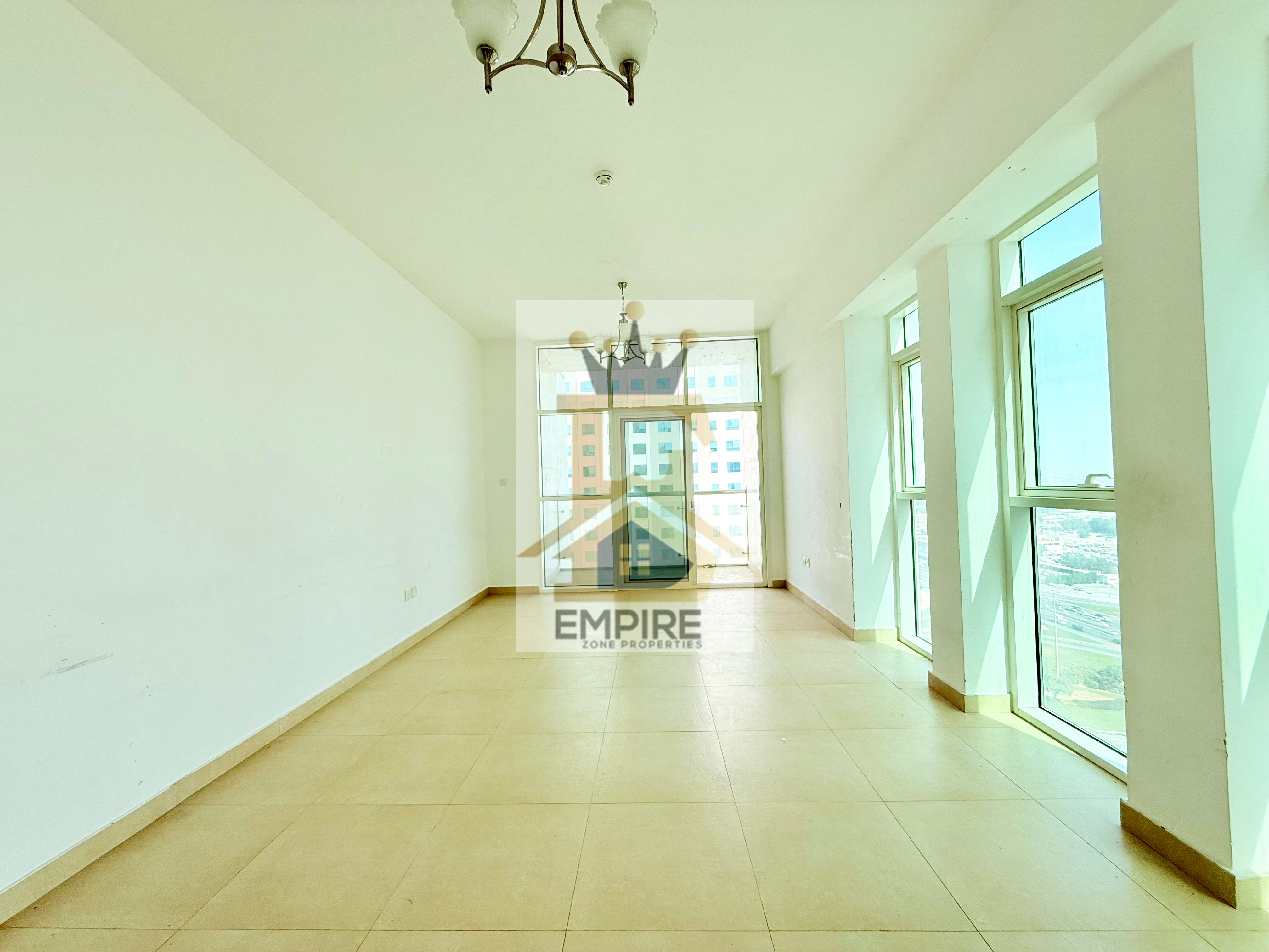 Bright Apartment Free parking maid room spacious hall with Balcony open view free Gym & Parking very Easy Exit to Dubai