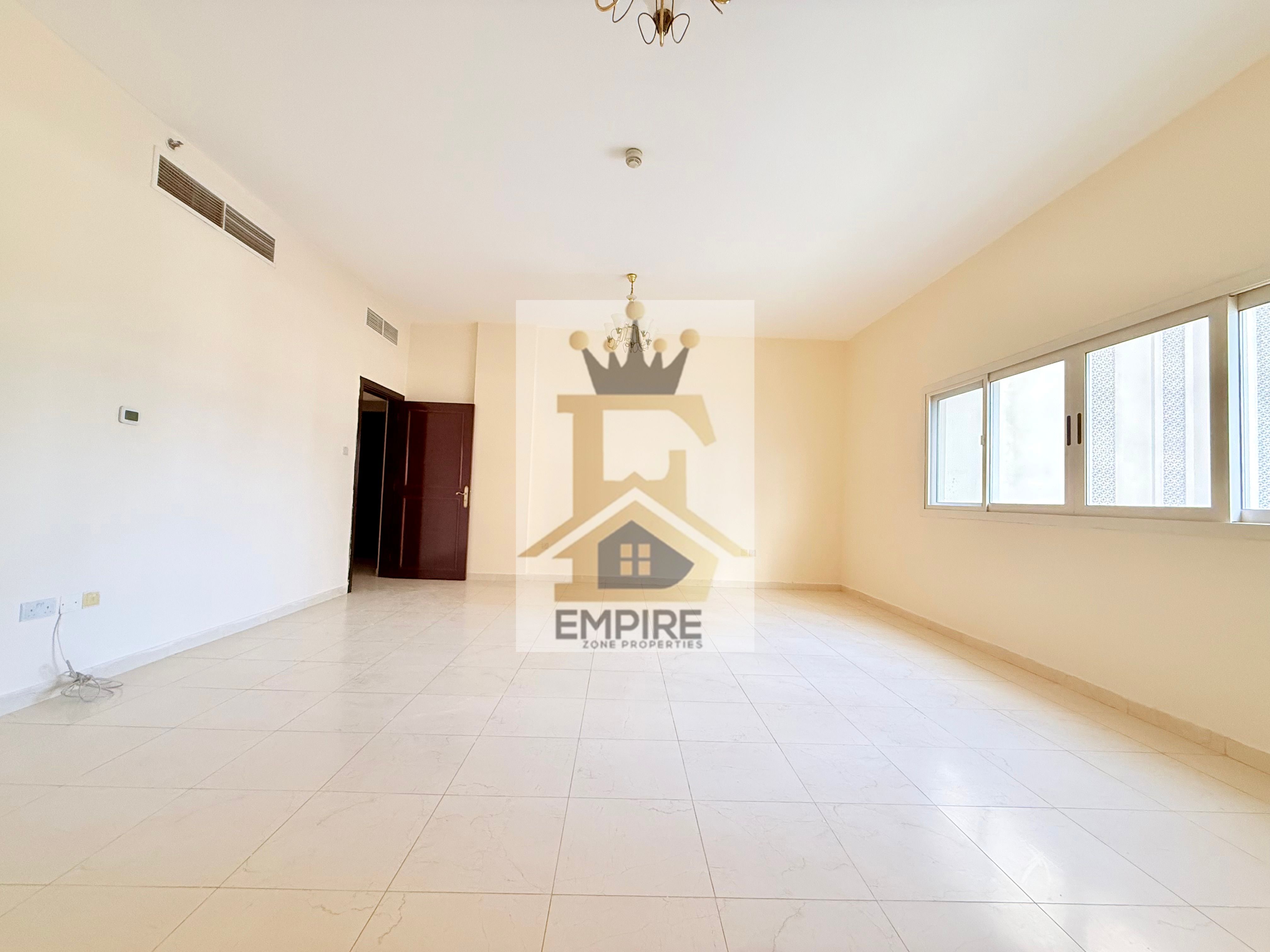 Big and Bright Apartment with free parking specious Hall free parking prime location very Easy Exit to Dubai