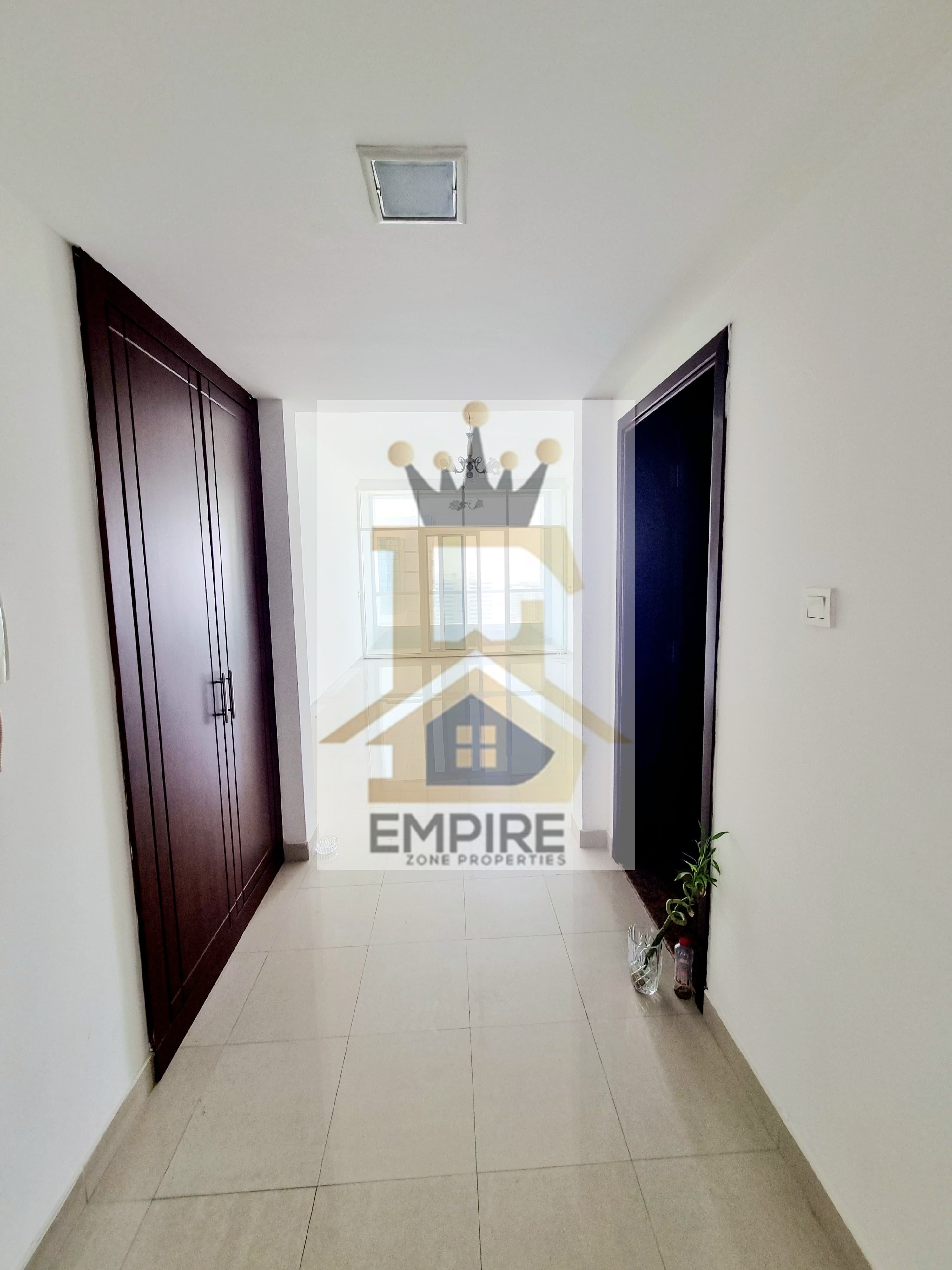 Spacious Appartment with wardrobe balcony swimming pool and gym free exit in dubai in al taawun Sharjah