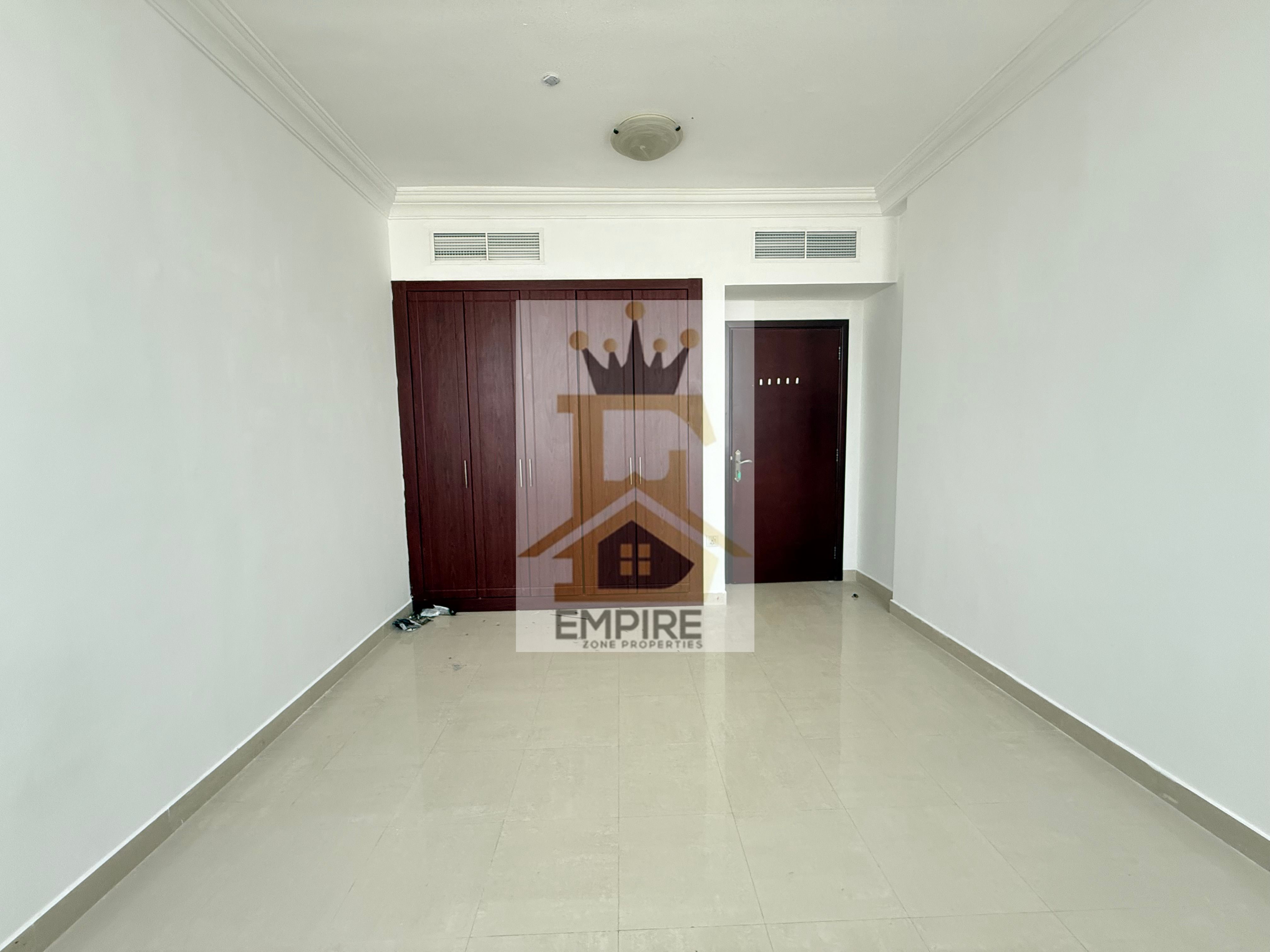 Spacious apartment with maintenence free gym swimming pool, free wardrobe balcony Open view easy exit dubai opposite ofNesto