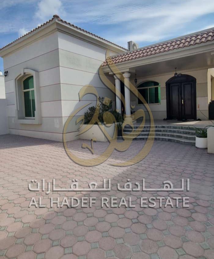 For rent in Al Mansoura: 2-story villa, 4 bedrooms, 3 bathrooms, 2 living rooms, 2 kitchens, maid room. Excellent finish. AED 90,000/year.