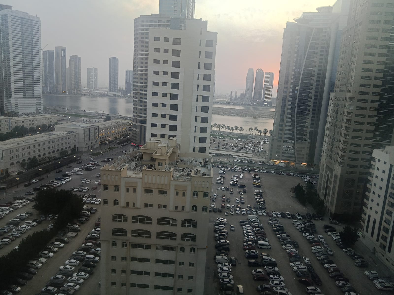 For rent in Al Majaz 3: 2BR with direct sea view, free AC, gym & pool, maintenance by landlord, elegant building, prime location.