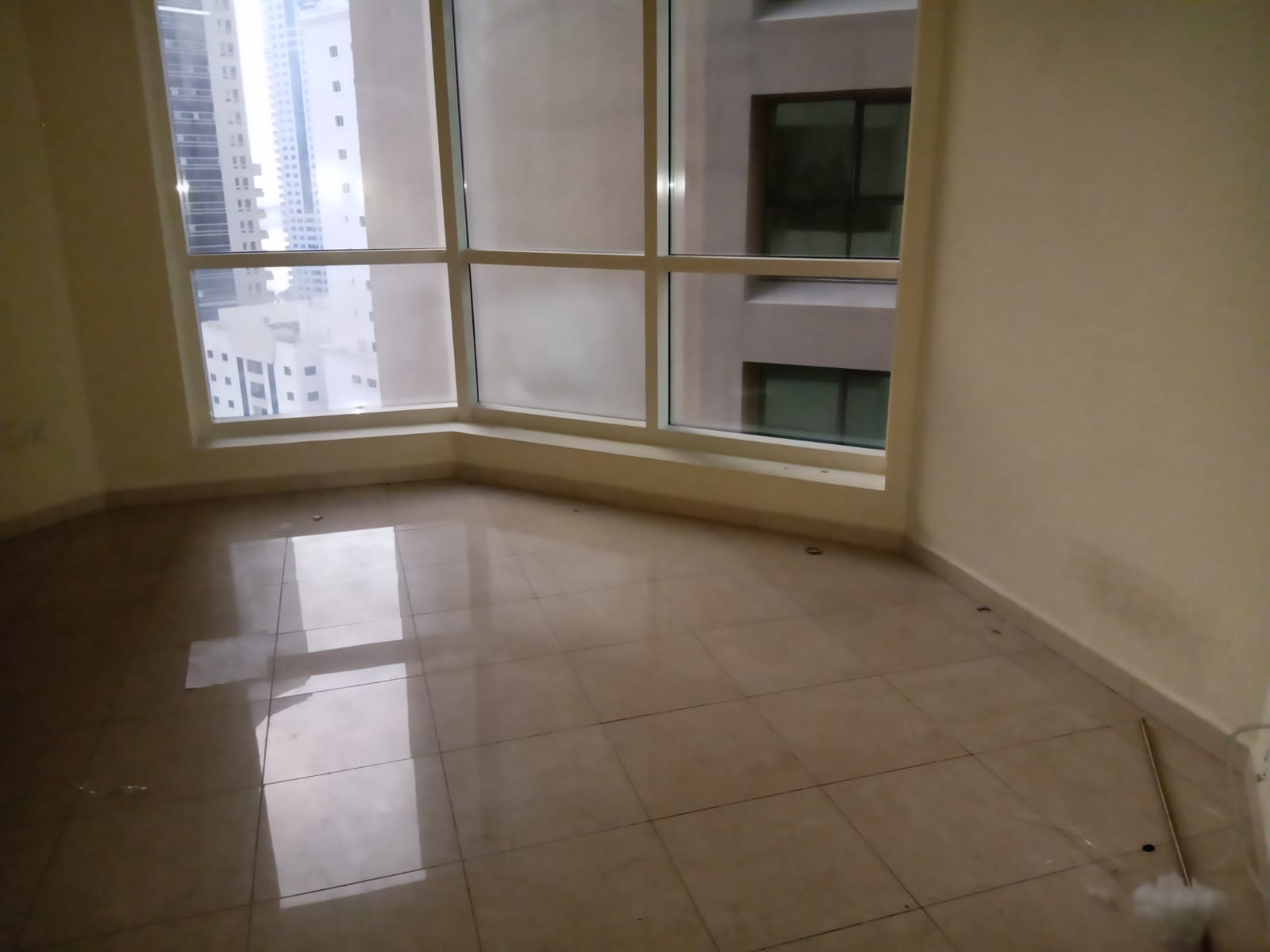 2BR apartment in Al Majaz 3 with direct sea view, free AC, gym & pool access, full maintenance by landlord, prime location.