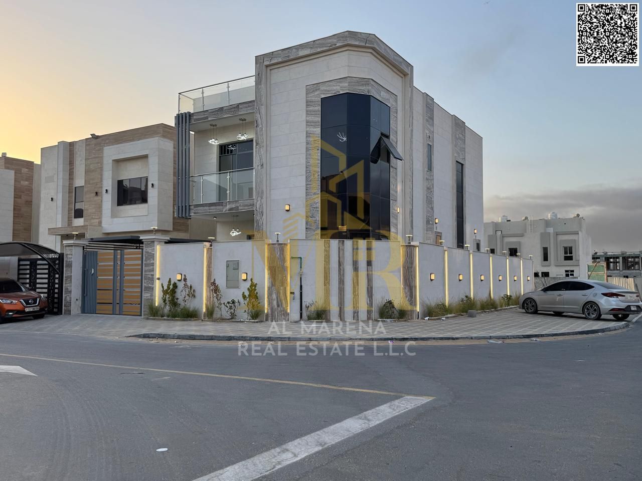 Corner villa for sale in Al Zahia, 3,014 sq ft, two floors, 5 master bedrooms, electricity and water included. Price negotiable.