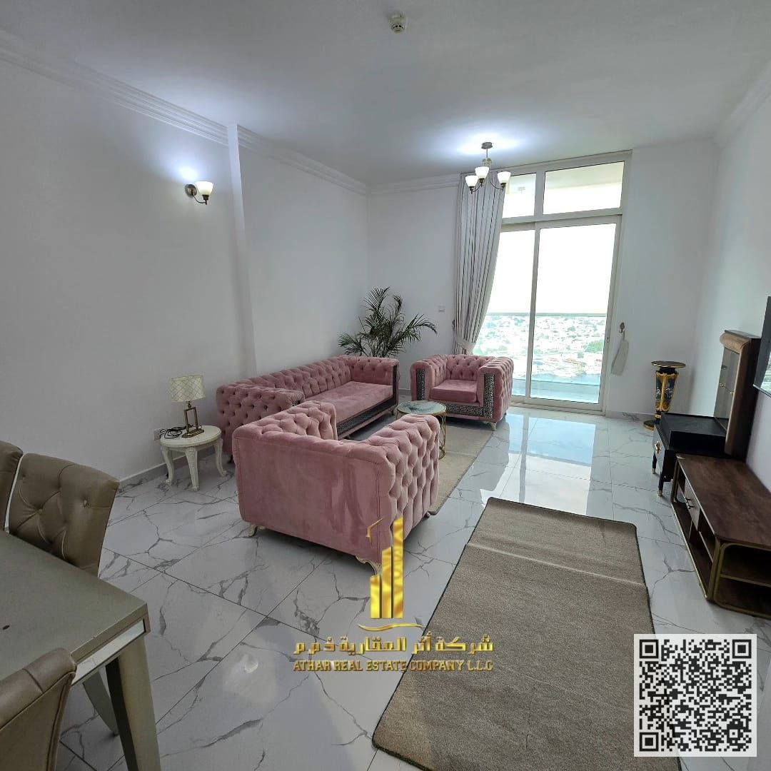 With an open view, a fully furnished Two-bedroom apartment with a living room for monthly rent in Ajman gym, swimming pool, and parking.