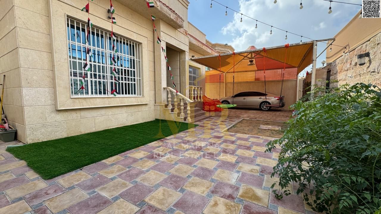 Villa for sale in Al Muwaihat 1 area, behind Nesto, price includes electricity, water, and air conditioning. Freehold ownership for all nationalities.