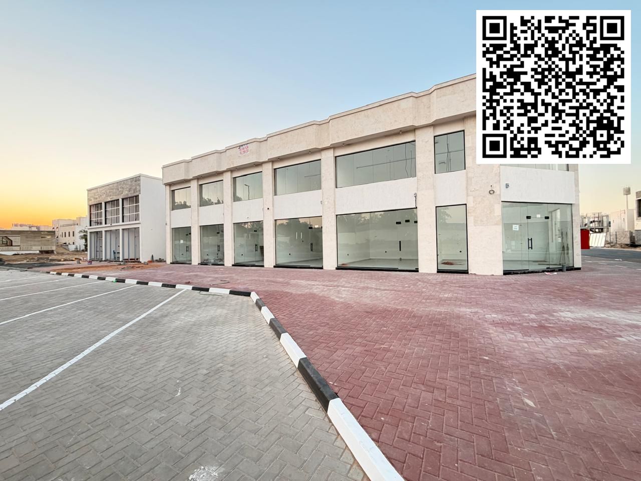 New commercial building for sale in Al Zahia area on the main street. Land area 7000 sq ft. Ground floor and mezzanine. Consists of 10 shops with larg