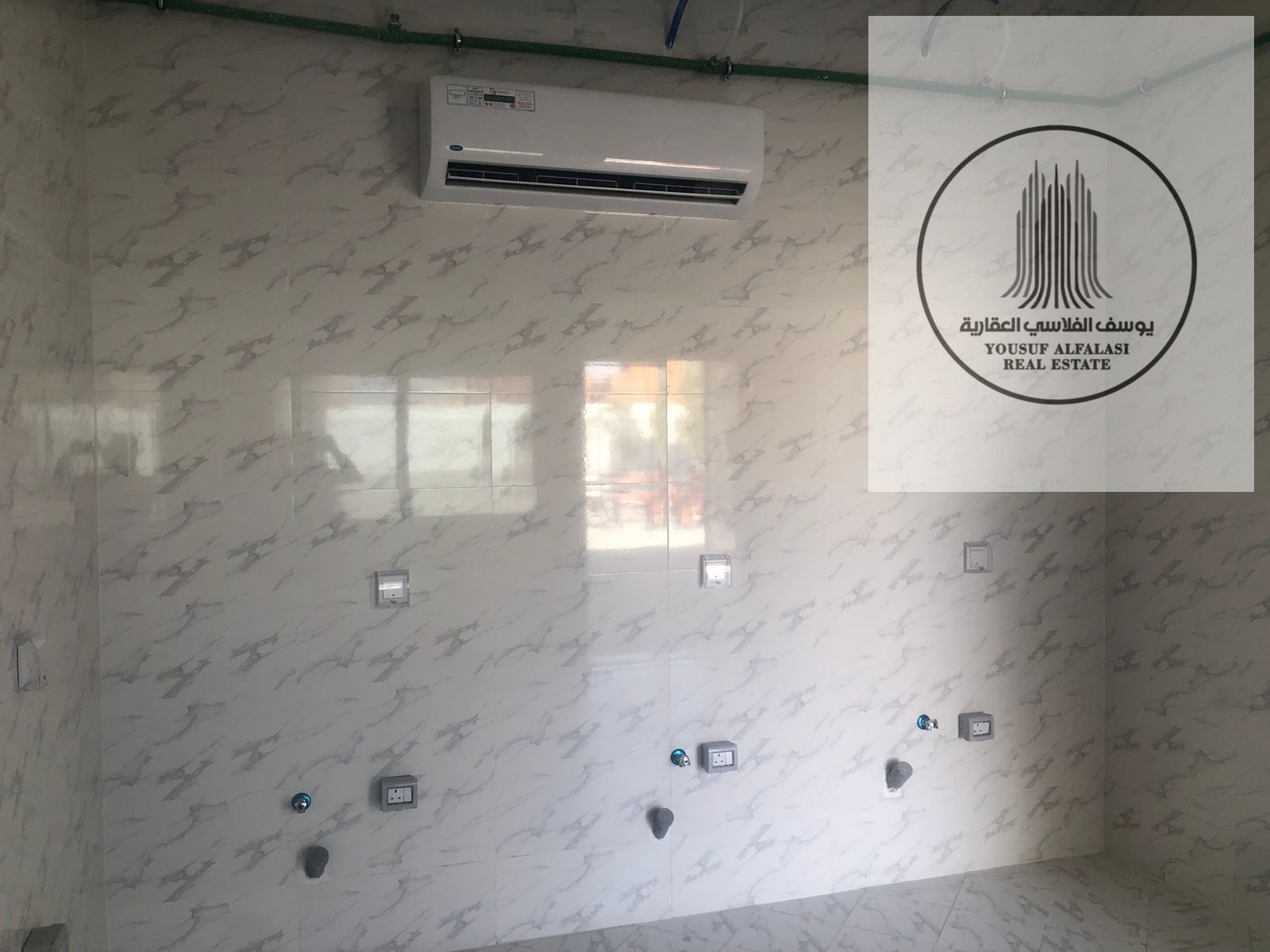 New workers' accommodation, first occupancy, Al Sajaa Industrial Area, 14 furnished rooms.
