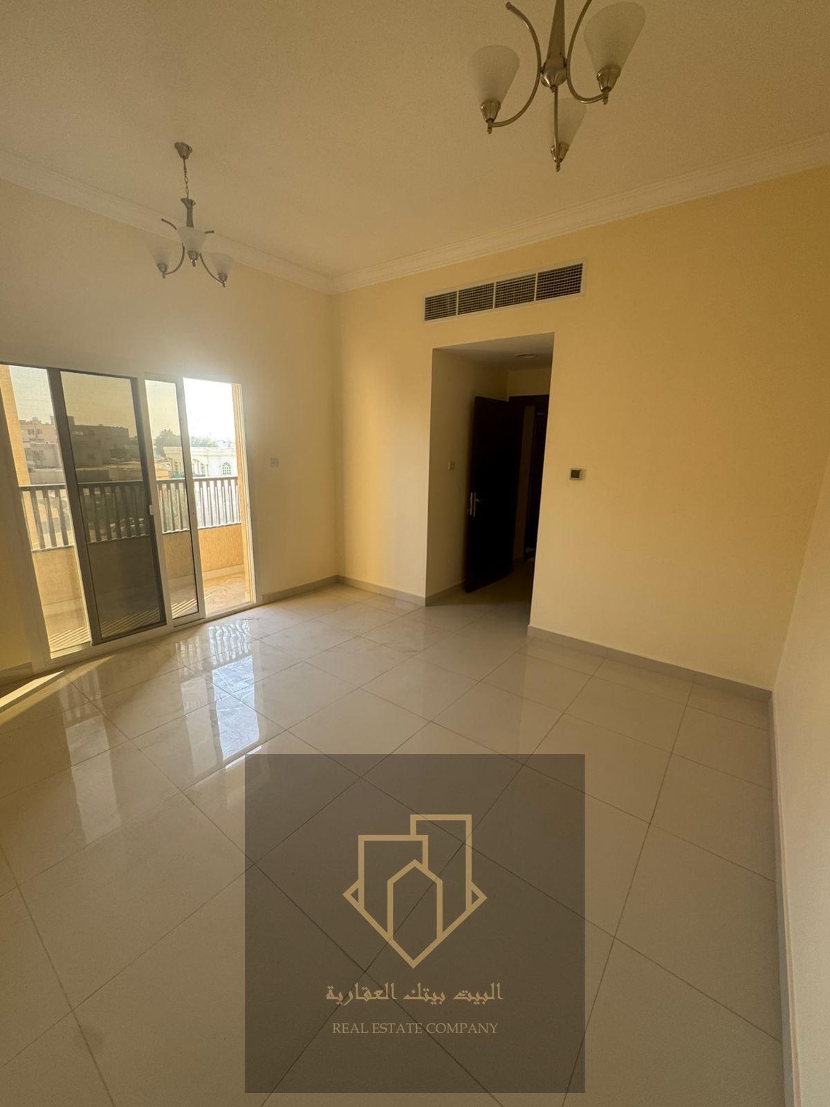 Brand-new first-occupant apartment in Al Rawda 1: 1 bedroom, living room with closed lounge, 2 bathrooms, balcony, spacious, 4-installment payment, security cheque.