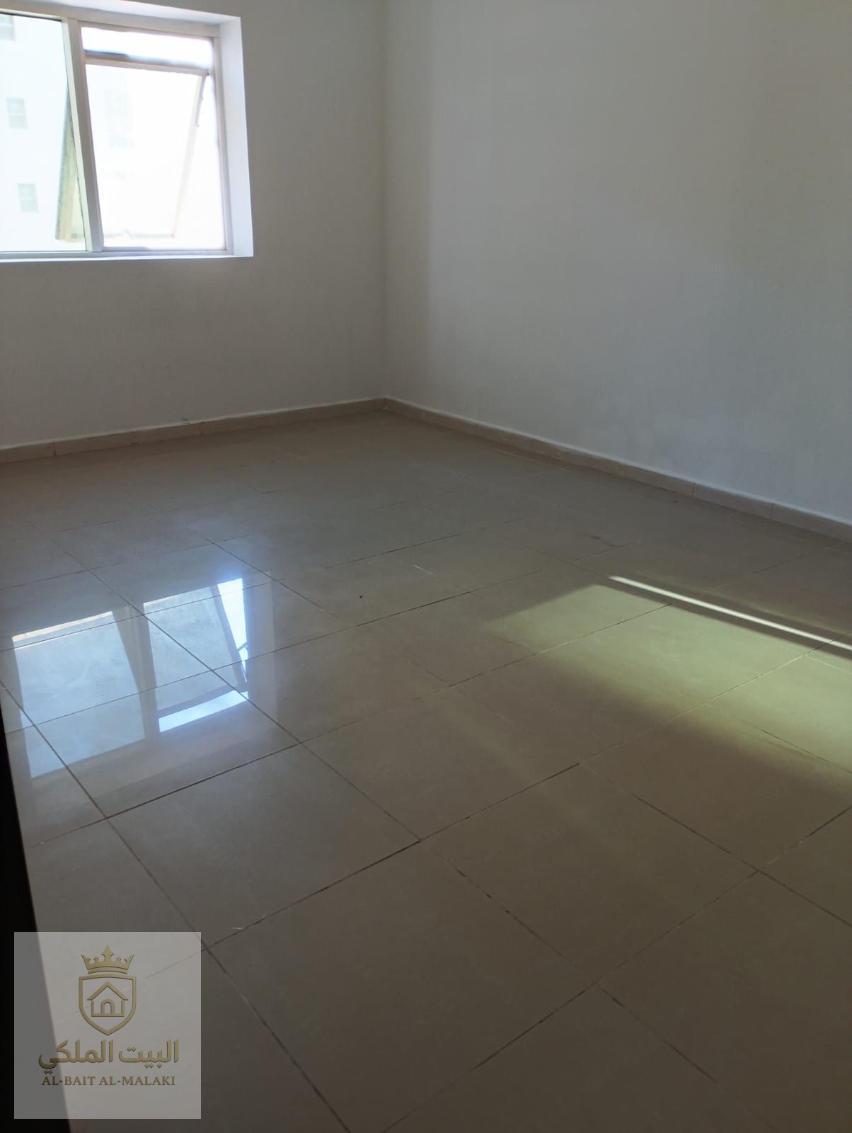 One-bedroom apartment with living room and balcony located in Al Khan area. The apartment features a practical layout with comfortable space, two bathrooms for added convenience, and good natural lighting and ventilation.