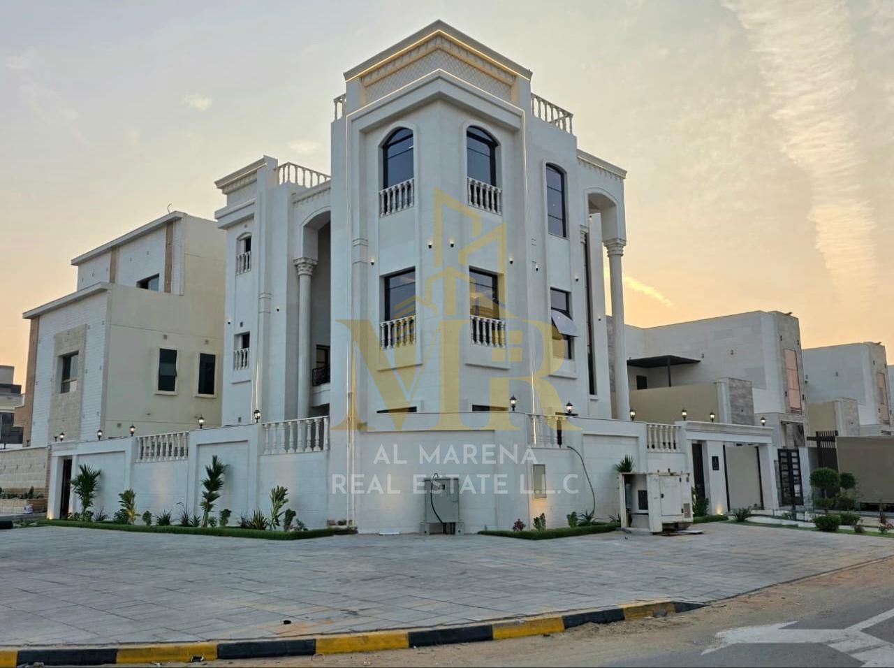 Luxury villa for sale in Ajman, Al Zahiyah area, corner location on two streets, prime strategic location, three floors, facade. Luxury villa for sal