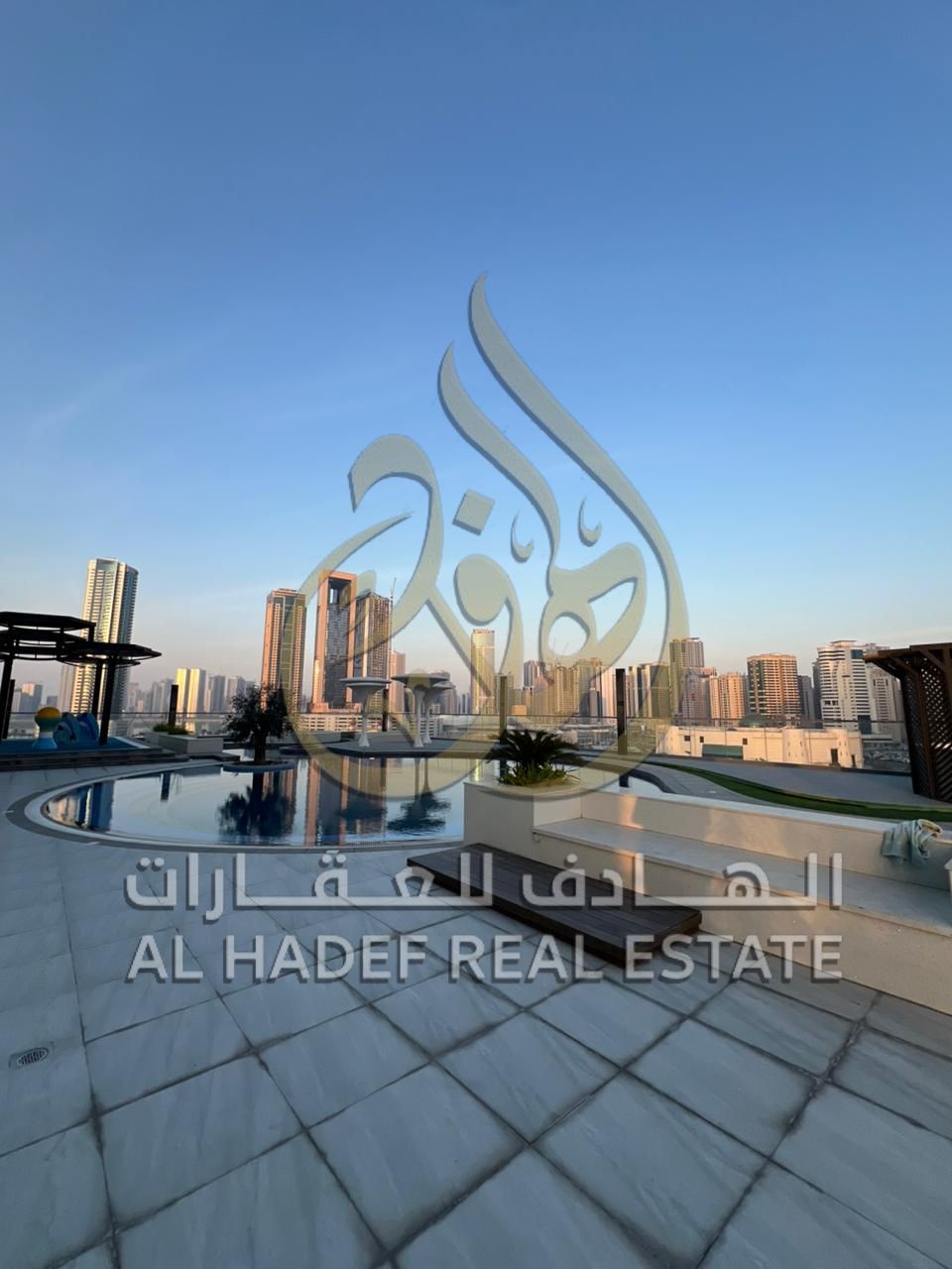 Available for rent in Al Taawun: 2 bedrooms and a living room, free gym and swimming pool, and free parking.