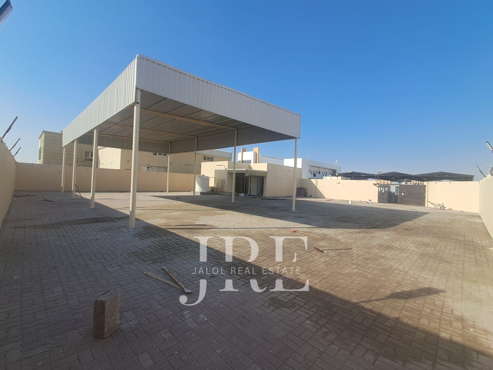 Warehouse for Rent in Sharjah | Open yard + Shops