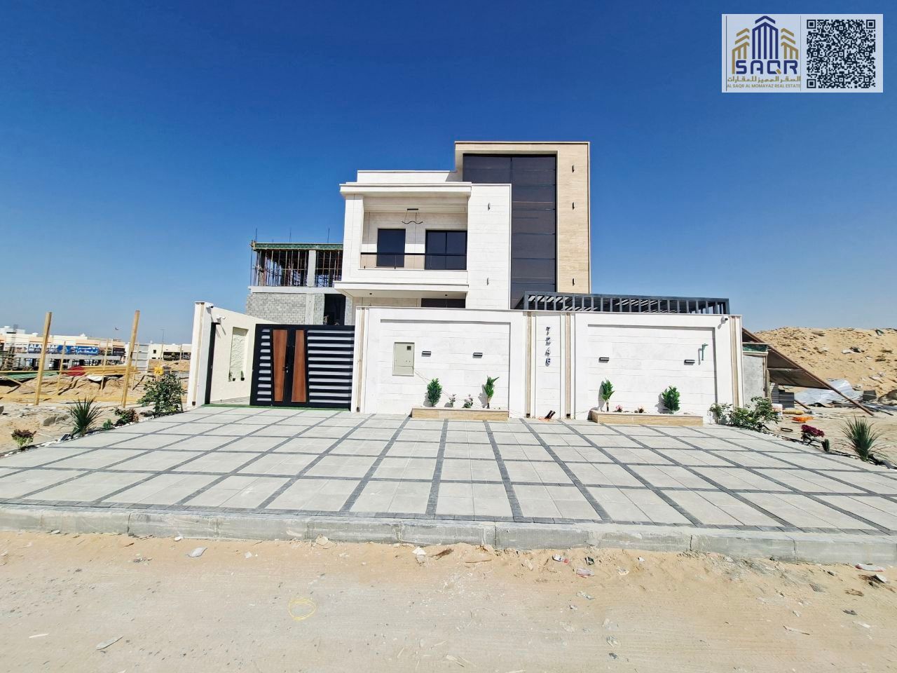 Deluxe villa, registration and ownership fees included, on the main street, ready to move in, in Ajman. Freehold ownership for all nationalities