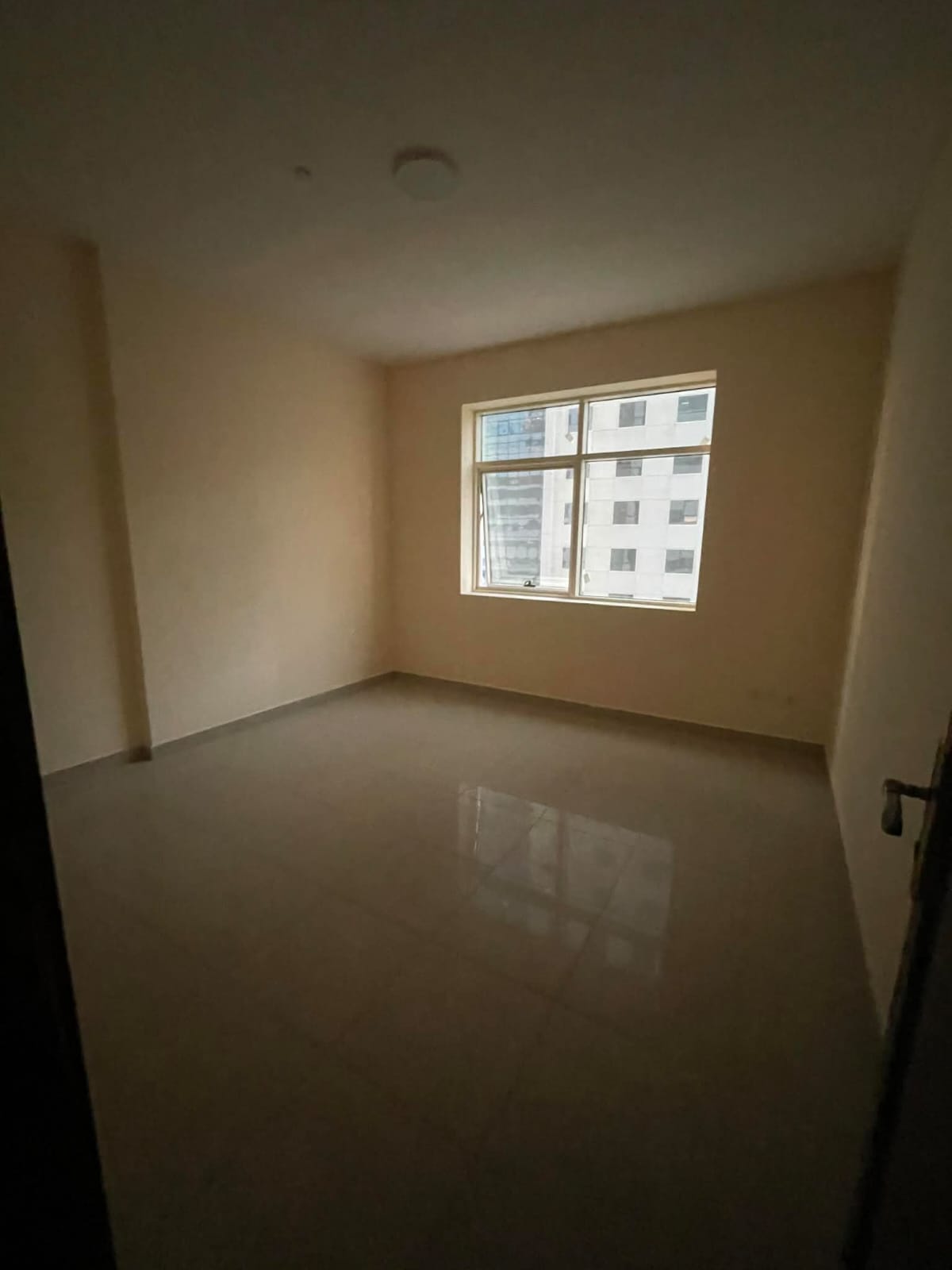 2BR apartment in Al Khan near the Corniche, 2 bathrooms, spacious layout, prime location close to services and transport.