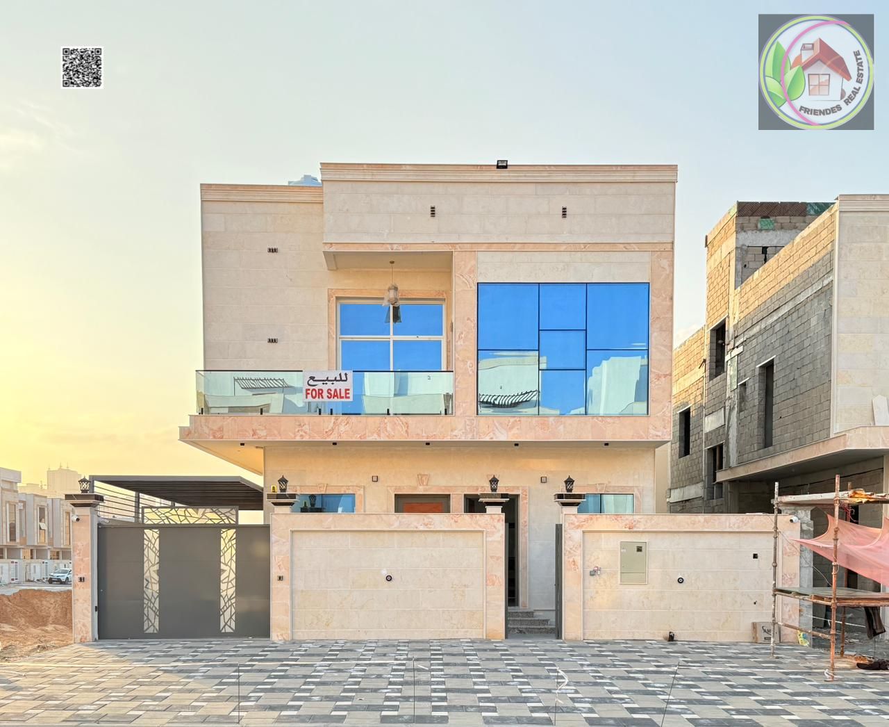 A distinctive two-story villa with a roof for sale in Ajman, Al Helio 2 area, at an attractive price including registration and ownership fees, and fr
