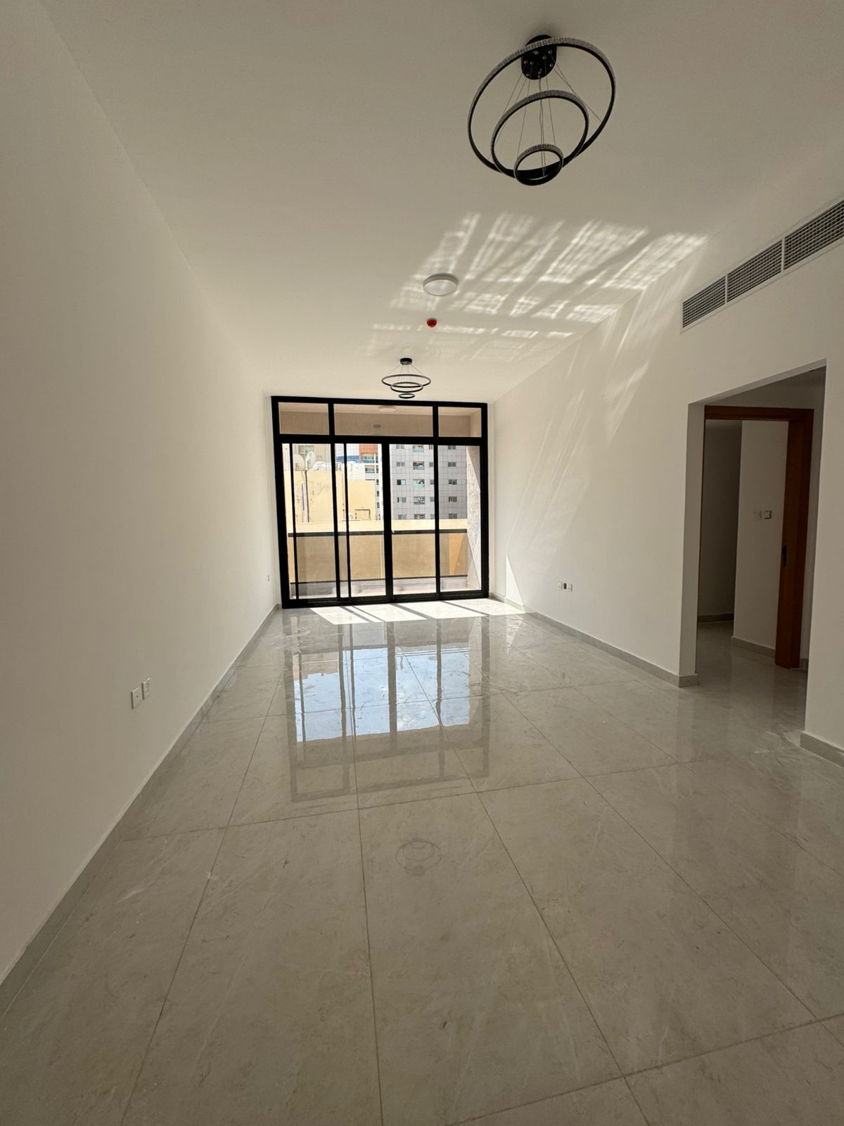 Elegant 2 master bedrooms + hall | Brand new, first tenant | Built-in wardrobes | Prime location near services, easy exit to Dubai & Sharjah.