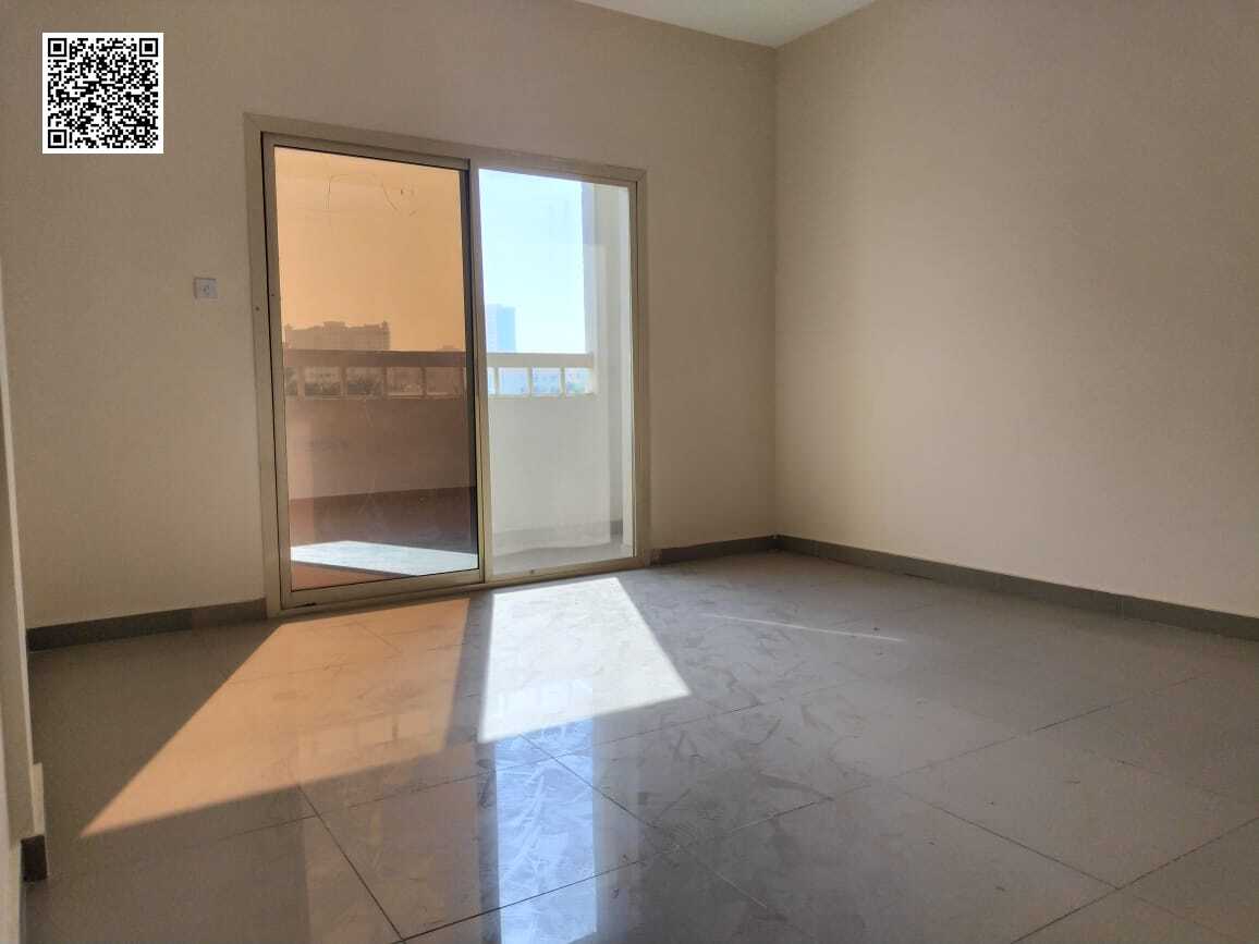 One bedroom and living room for rent in Ajman Corniche | Balcony + Split AC | Prime location | AED 26,000