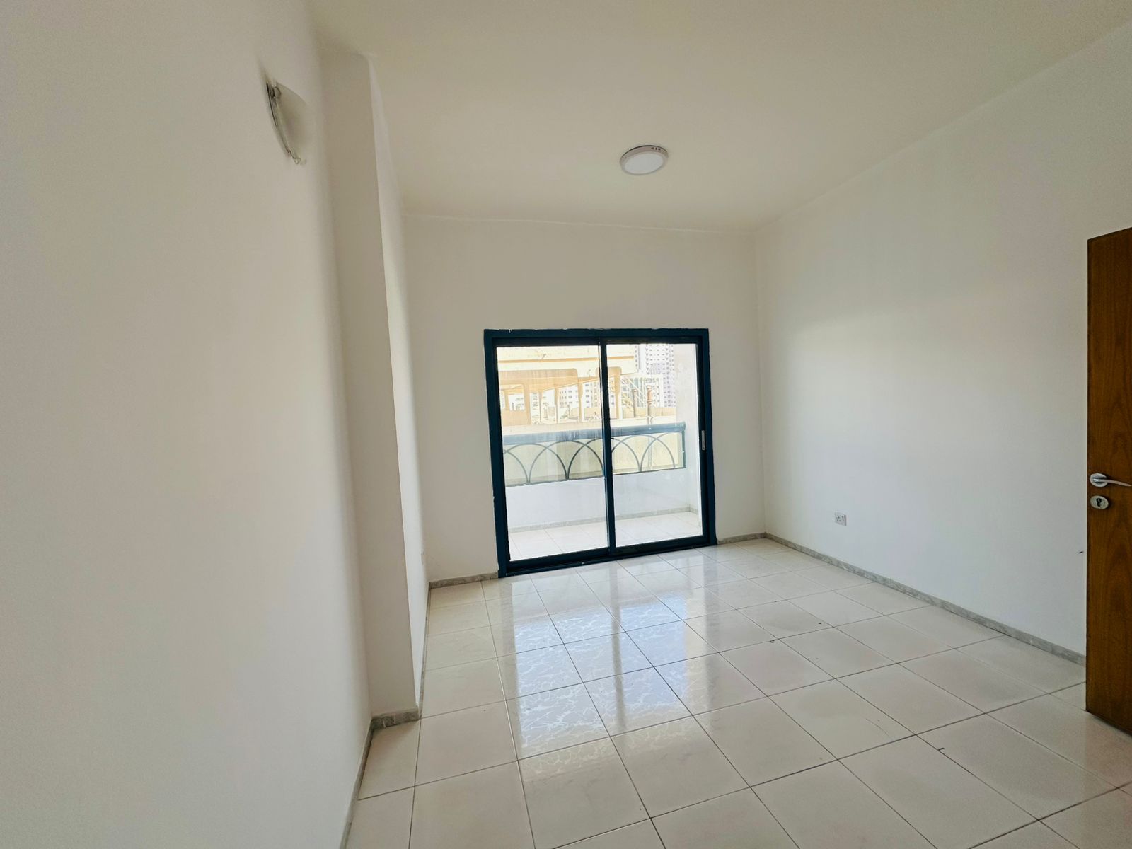 Free AC | 2BR & Living | Spacious | Family Bldg | Open-View Balcony | Built-in Wardrobes | Easy Access to Dubai
