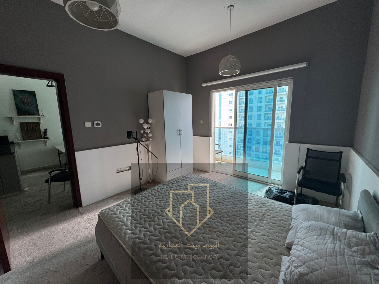 One-bedroom apartment with a living room in City Tower, featuring an open view and a balcony, 2 bathrooms, fully furnished, with parking included.