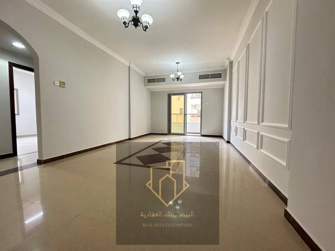 Two-bedroom apartment with a living room in Al Nuaimiya 1, large space, 2 bathrooms, clean building, second occupancy, balcony, located in an area wit