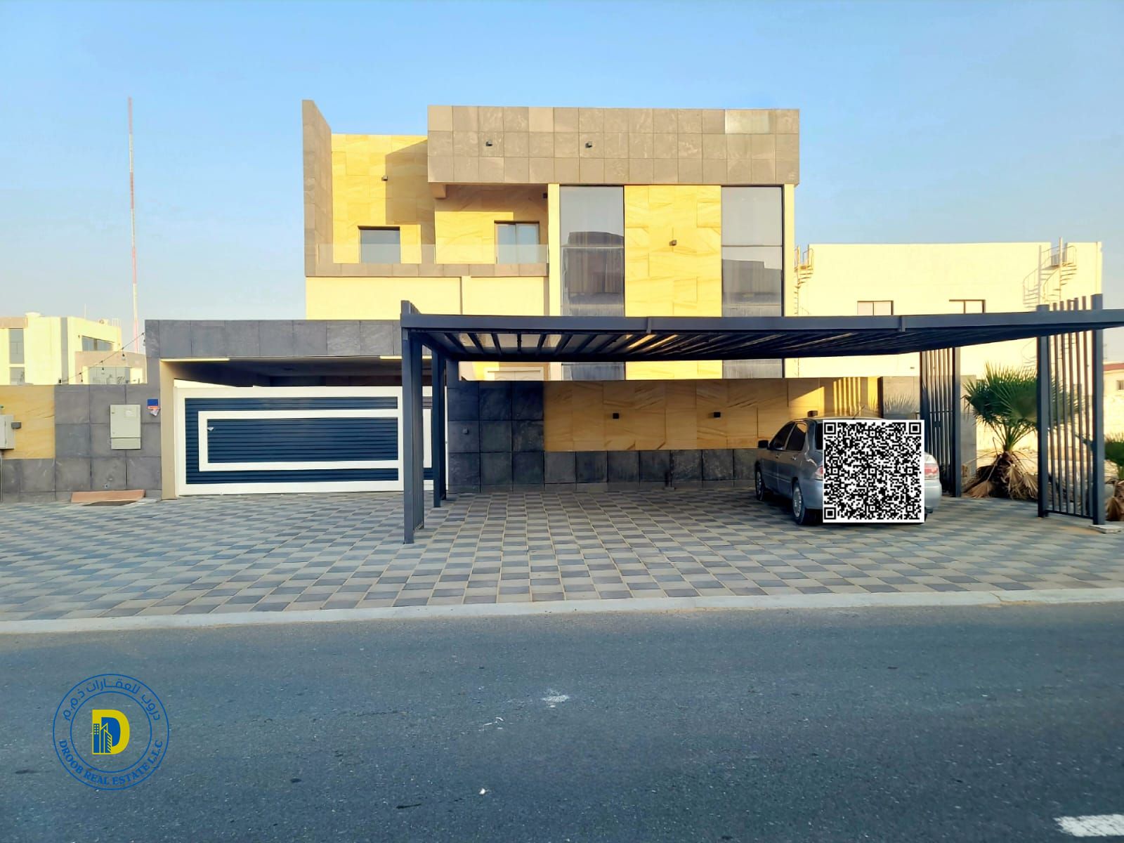 Luxury villa for sale in Al-Helio 1 area, 5 bedrooms, including electricity, water, and AC. Freehold for all nationalities. Bank financing.