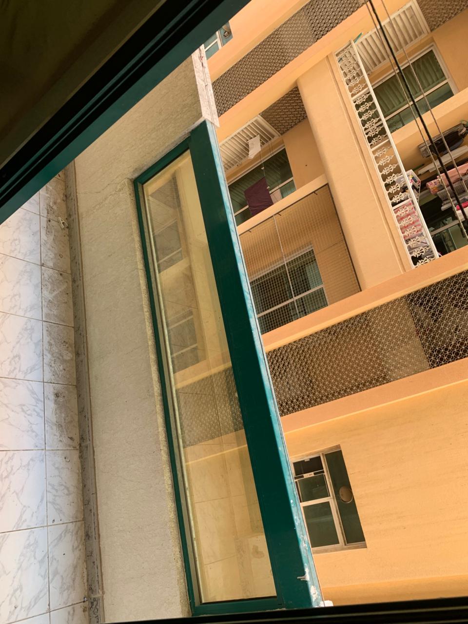 1BR apartment in Al Qasimia Al Mahatta, approved for bachelors, kitchen and bathroom, rent AED 35,000, 6 installments, no parking.
