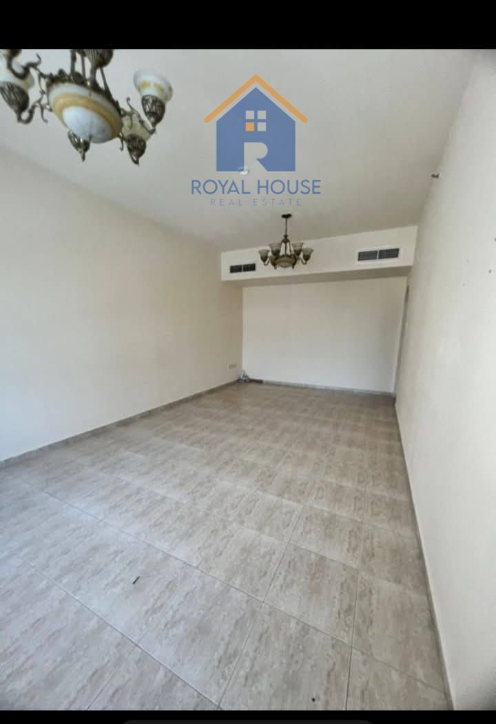 Spacious 1 BR on New Al Taawun Road: Affordable Waterfront Living