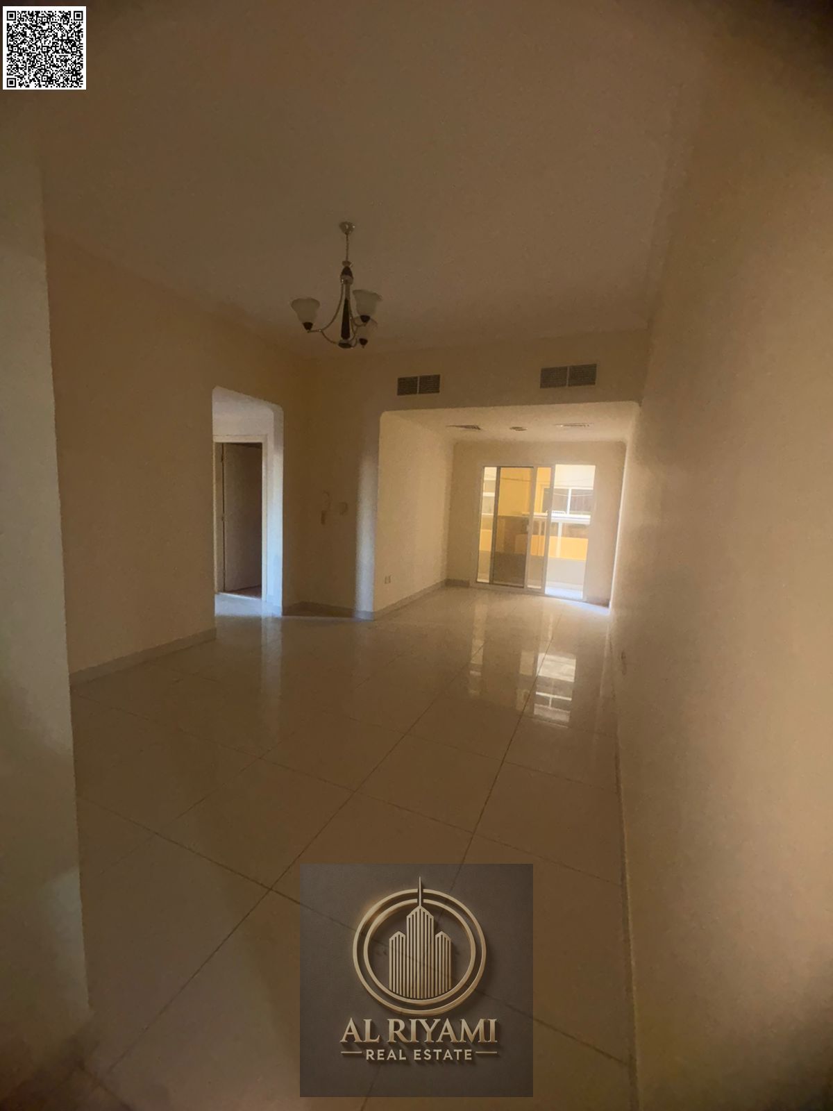 Two-bedroom apartment with a living room for annual rent in Al Nuaimiya 1, with a side balcony.
