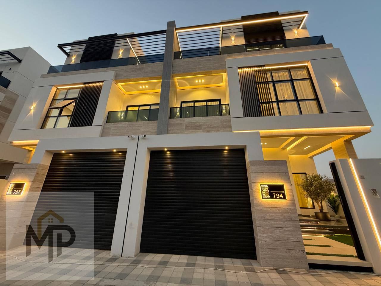 Semi-detached villas for sale in Al Tallah – Modern design, spacious living areas, elevator, and rooftop terrace.