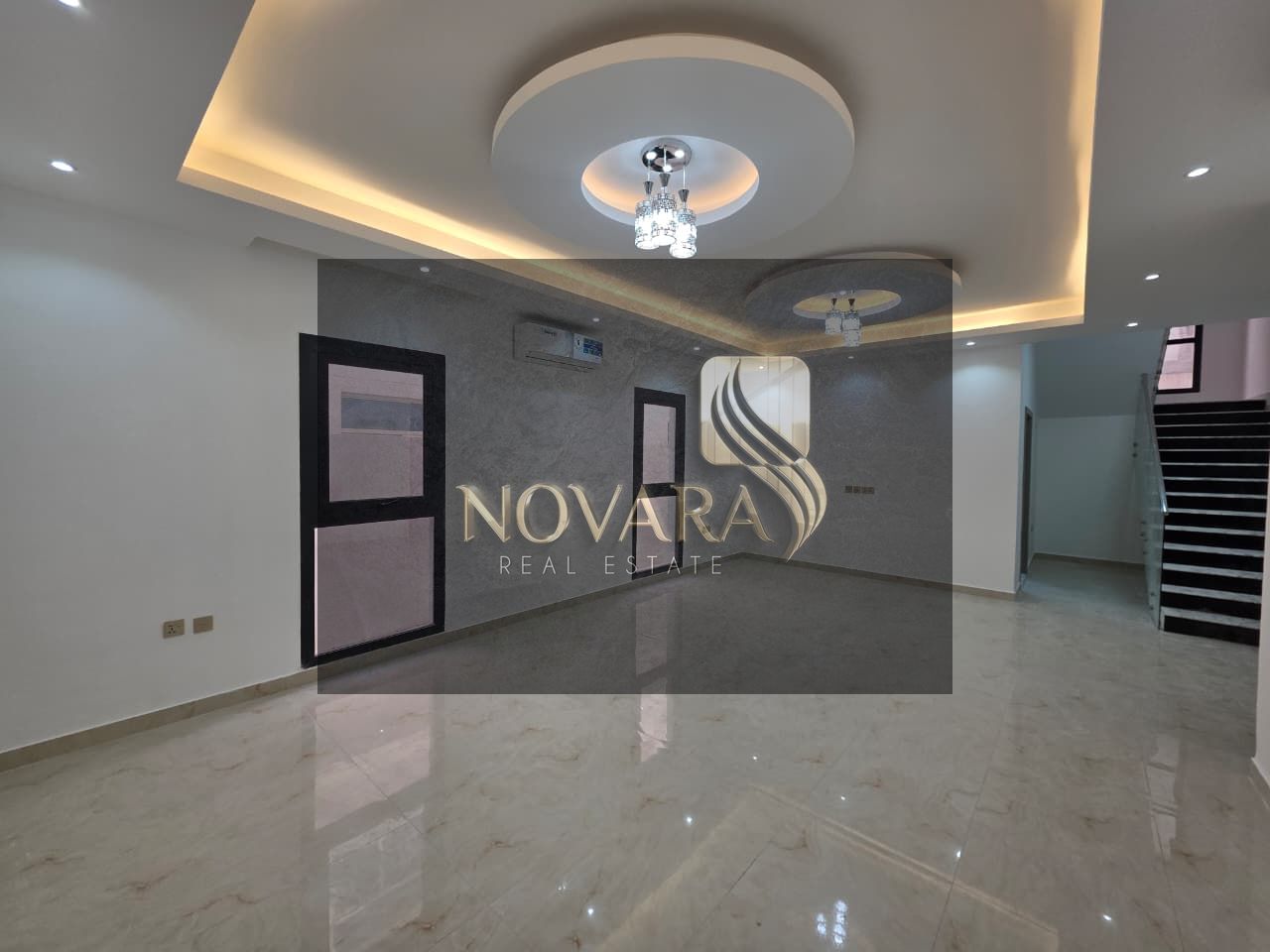 Elegant villa with 5 master bedrooms, 2 kitchens, and multiple parking spaces in Al Yasmin, priced at 115,000 AED payable in 3 installments – an unmis