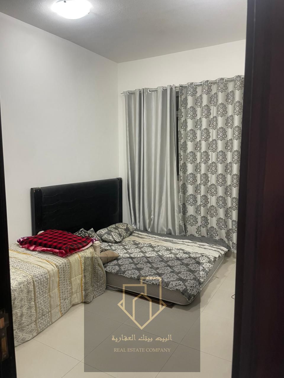 Resale one-bedroom, one living room apartment in Al Ameera Village, down payment 250,988 AED, practical layout, prime location near services, ideal for living or investment.