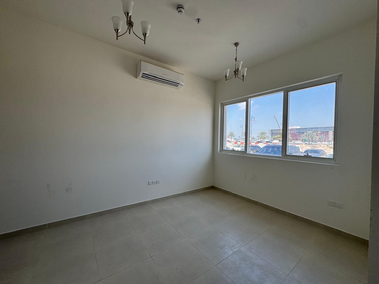 Brand-new studio in Al Zahia, modern finishing, separate kitchen, new building, prime location near malls, easy access to Dubai.