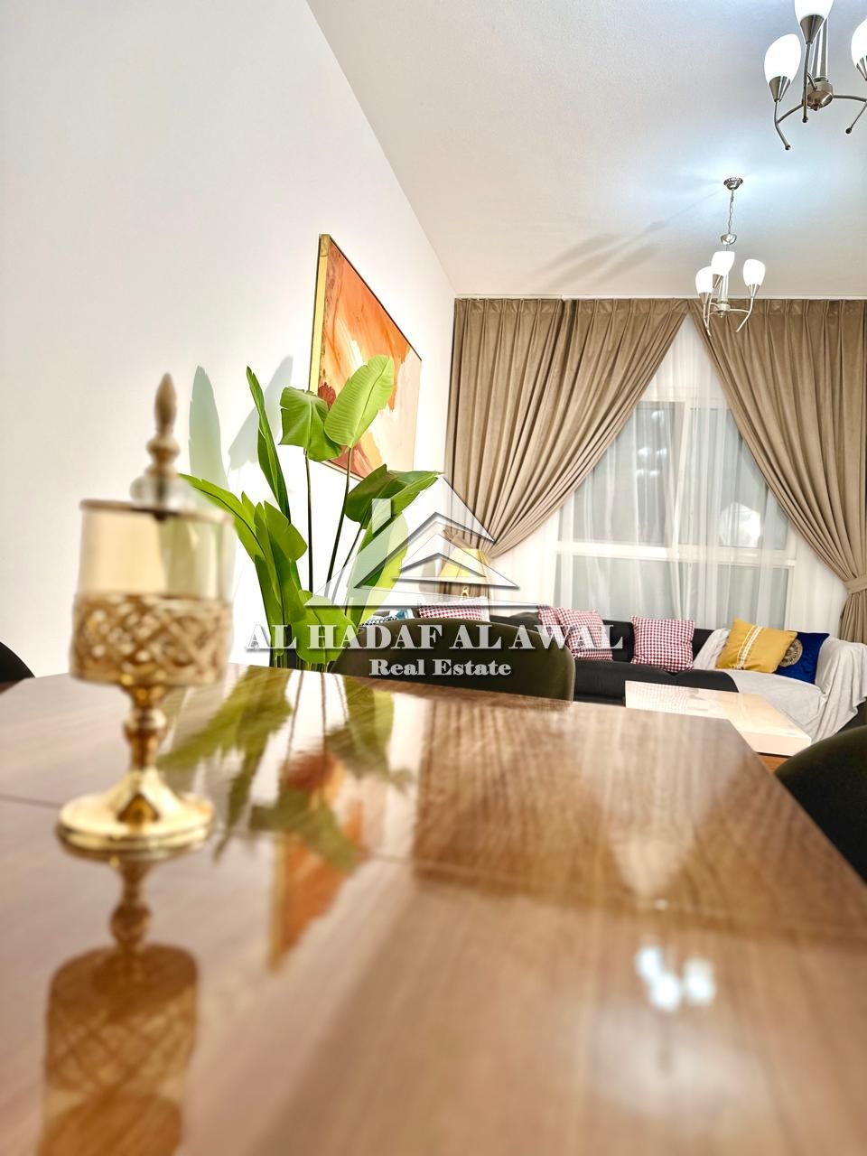 Muwailih Commercial, steps from Zahia City Center. One bedroom and living room with two bathrooms. Rent 5200 QAR including internet and parking.