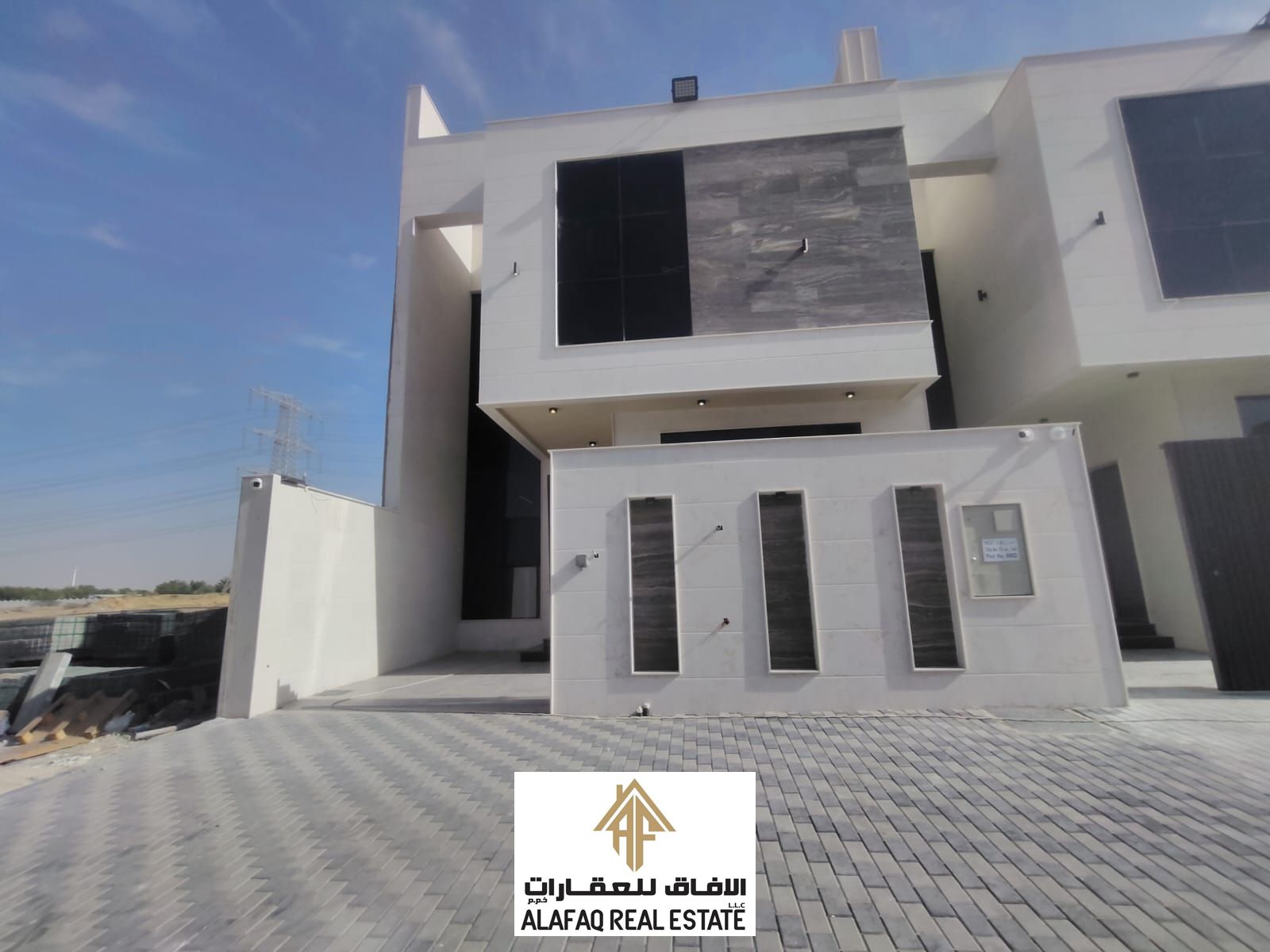 Luxury Townhouse Villa for Sale in Al Helio 2, Ajman featuring modern architectural design, premium high-end finishing, five master bedrooms, spacious