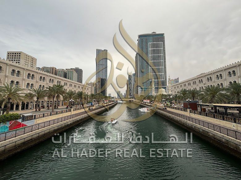 : Opportunity in Al Khan | Super Deluxe Furnished Apartment Overlooking Al Qasba | Gym, Swimming Pool, and Parking