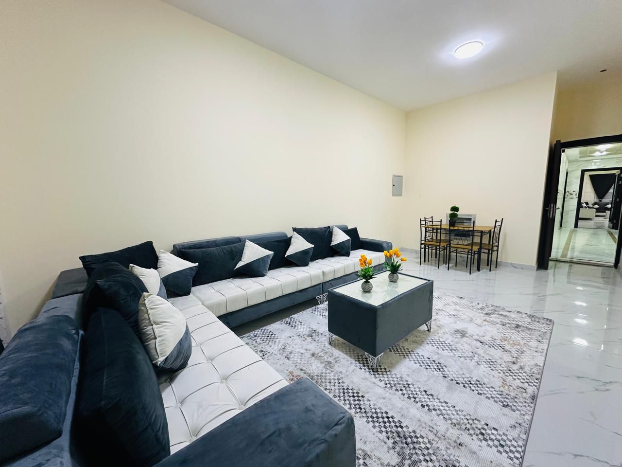 For monthly rent: One bedroom and living room, fully furnished with new furniture in Rashidiya 3 | Includes bills and internet | Behind Grand Mall
