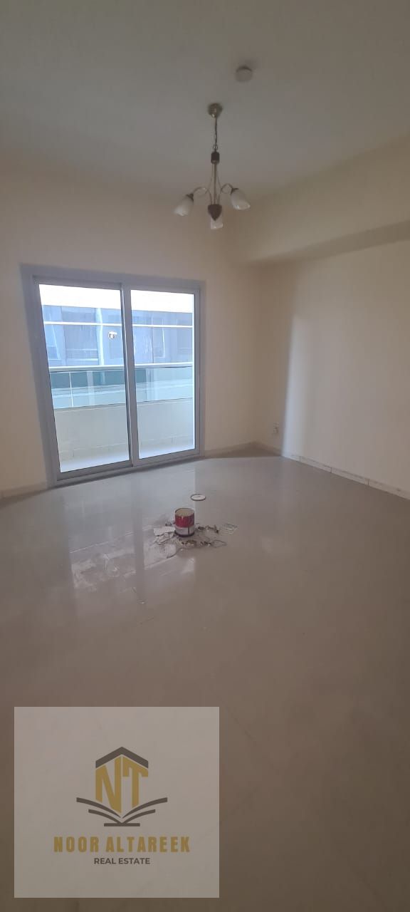 Presented by Noor Al Tareeq Real Estate A distinctive apartment is available for annual rent in Al Taawun, located in a strategic area close to all