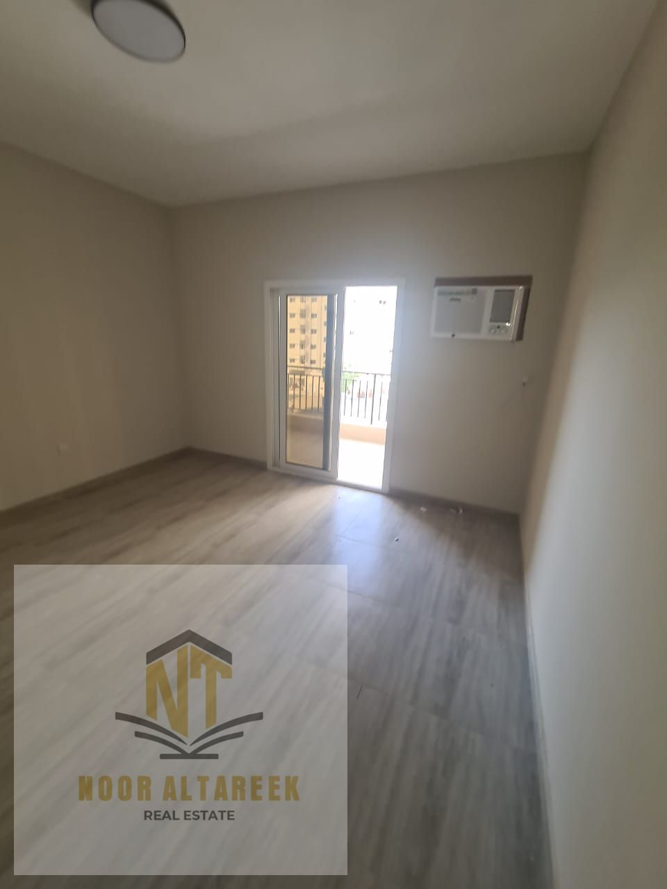 Apartment in Al Majaz 2, Al Wahda Street, two bedrooms and a living room, first occupancy after renovation, two bathrooms and a balcony with an open v