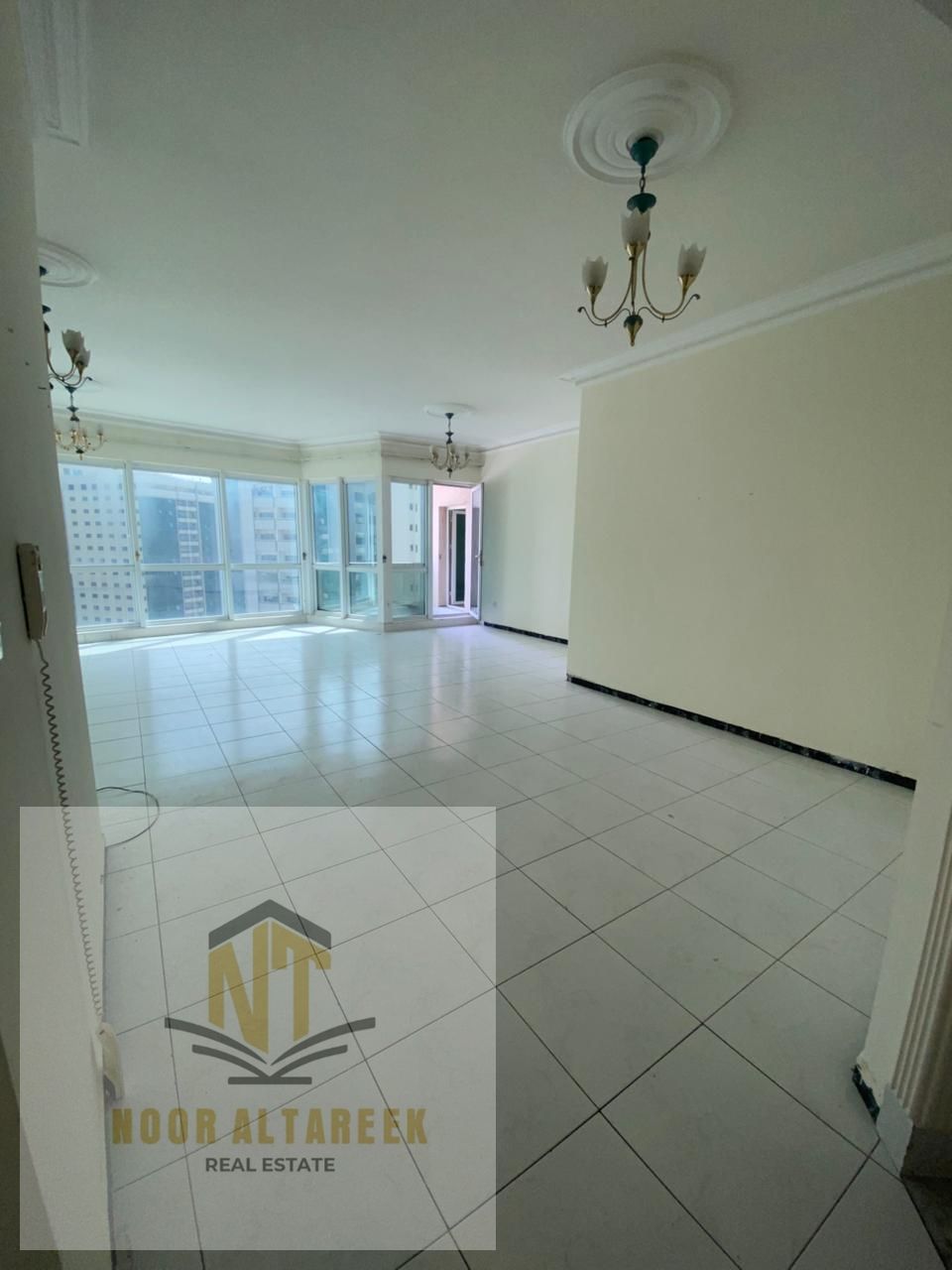 Al Majaz 2 apartment, three rooms Hall and balcony 4 bathroom Maid's room Free air conditioning