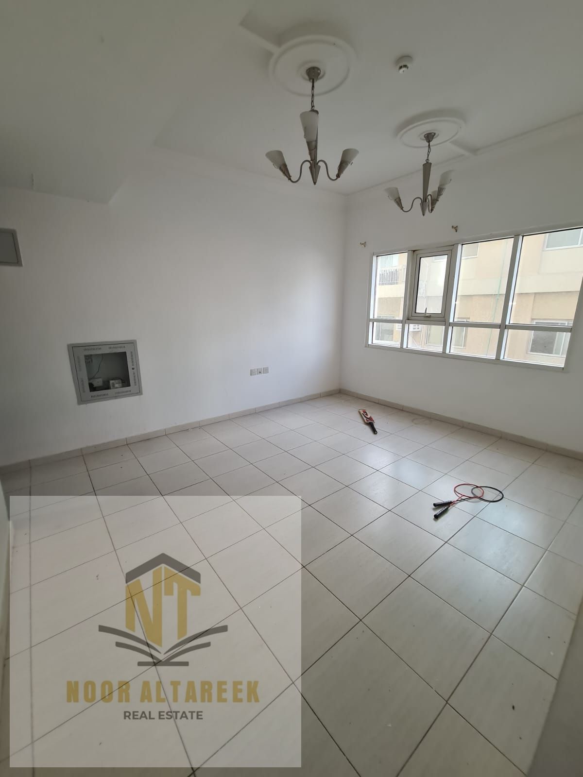 A room, a hall, and two bathrooms, a minute from the Corniche