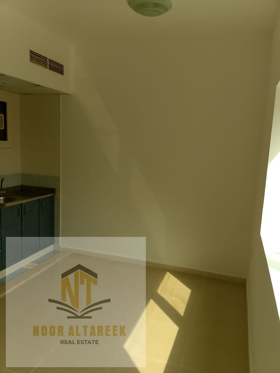 Studio for rent in Al Taawun, offering 300 sq. ft. of comfortable living space. The studio features central air conditioning to ensure a pleasant atmo