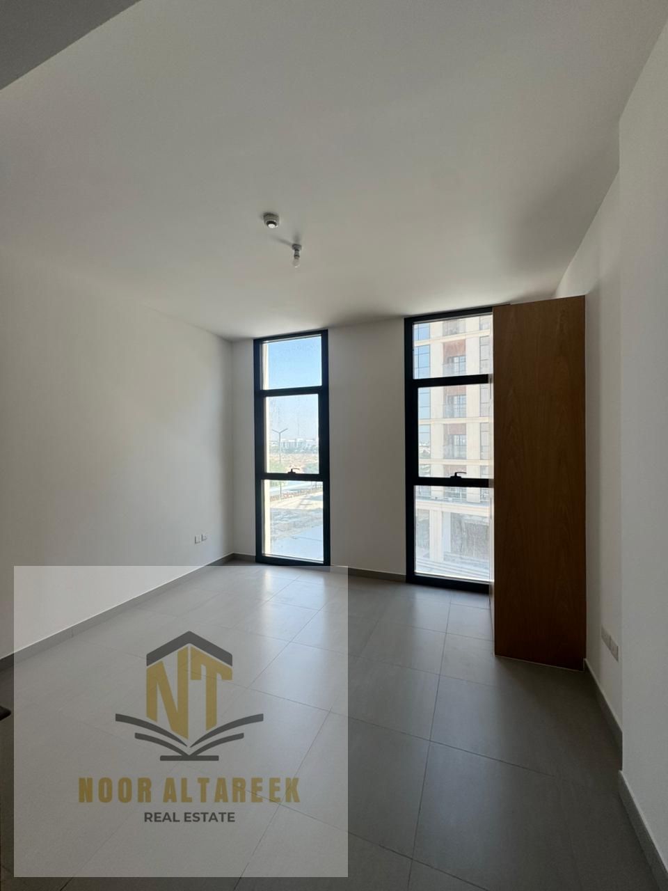 Studio apartment for sale in Sharjah, Al Mamsha project. Freehold ownership for all nationalities. Includes parking, gym, and full amenities within th