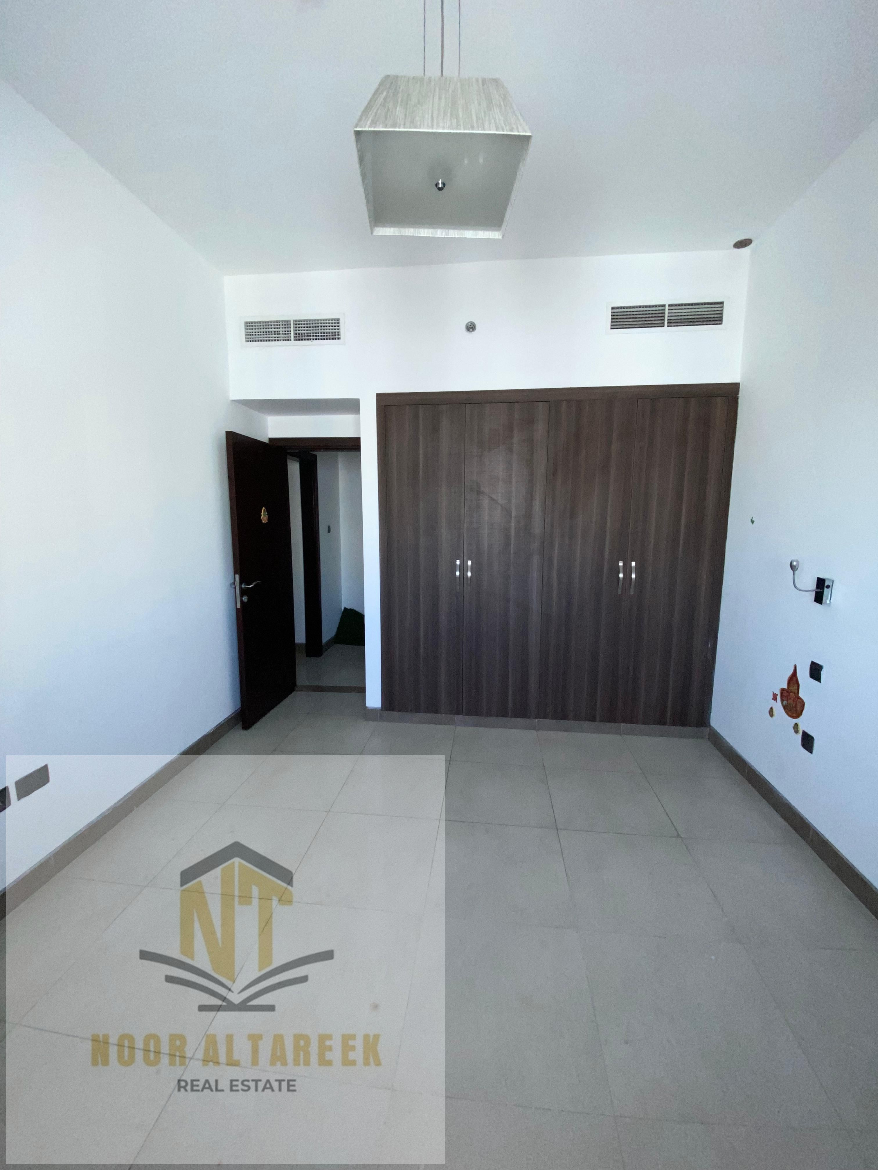 An apartment for rent in Al Qasimia, consisting of one bedroom, a living hall, and one bathroom, located in a prime area close to all essential servic
